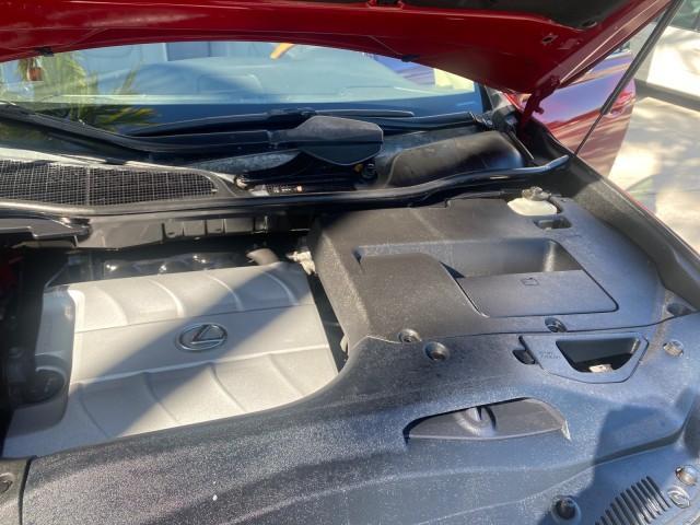 2012 Matador Red Mica /Parchment Lexus RX 350 LOW MILES 68,785 1 OWNER NAV (2T2ZK1BA6CC) with an 3.5L DOHC SFI 24-Valve V6 Engine engine, Automatic transmission, located at 4701 North Dixie Hwy, Pompano Beach, FL, 33064, (954) 422-2889, 26.240938, -80.123474 - OUR WEBPAGE FLORIDACARS1.COM HAS OVER 100 PHOTOS AND FREE CARFAX LINK 2012 LEXUS RX 350 1 OWNER SUNROOF NAVIGATION LOADED VIN: 2T2ZK1BA6CC065213 2 T 2 Z K 1 B A 6 C C 0 6 5 2 1 3 4 DOOR WAGON/SPORT UTILITY 3.5L V6 F DOHC 24V GASOLINE 25 MPG FRONT WHEEL DRIVE Features A/C Seat(s) ABS Brakes Air Condi - Photo#25