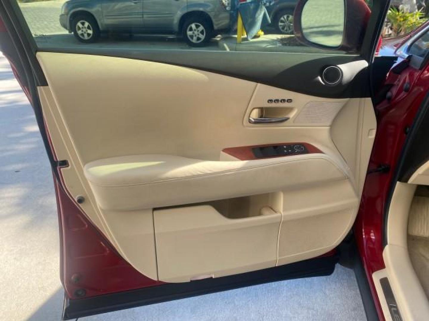 2012 Matador Red Mica /Parchment Lexus RX 350 LOW MILES 68,785 1 OWNER NAV SUV (2T2ZK1BA6CC) with an 3.5L DOHC SFI 24-Valve V6 Engine engine, Automatic transmission, located at 4701 North Dixie Hwy, Pompano Beach, FL, 33064, (954) 422-2889, 26.240938, -80.123474 - OUR WEBPAGE FLORIDACARS1.COM HAS OVER 100 PHOTOS AND FREE CARFAX LINK 2012 LEXUS RX 350 1 OWNER SUNROOF NAVIGATION LOADED VIN: 2T2ZK1BA6CC065213 2 T 2 Z K 1 B A 6 C C 0 6 5 2 1 3 4 DOOR WAGON/SPORT UTILITY 3.5L V6 F DOHC 24V GASOLINE 25 MPG FRONT WHEEL DRIVE Features A/C Seat(s) ABS Brakes Air Condi - Photo#41