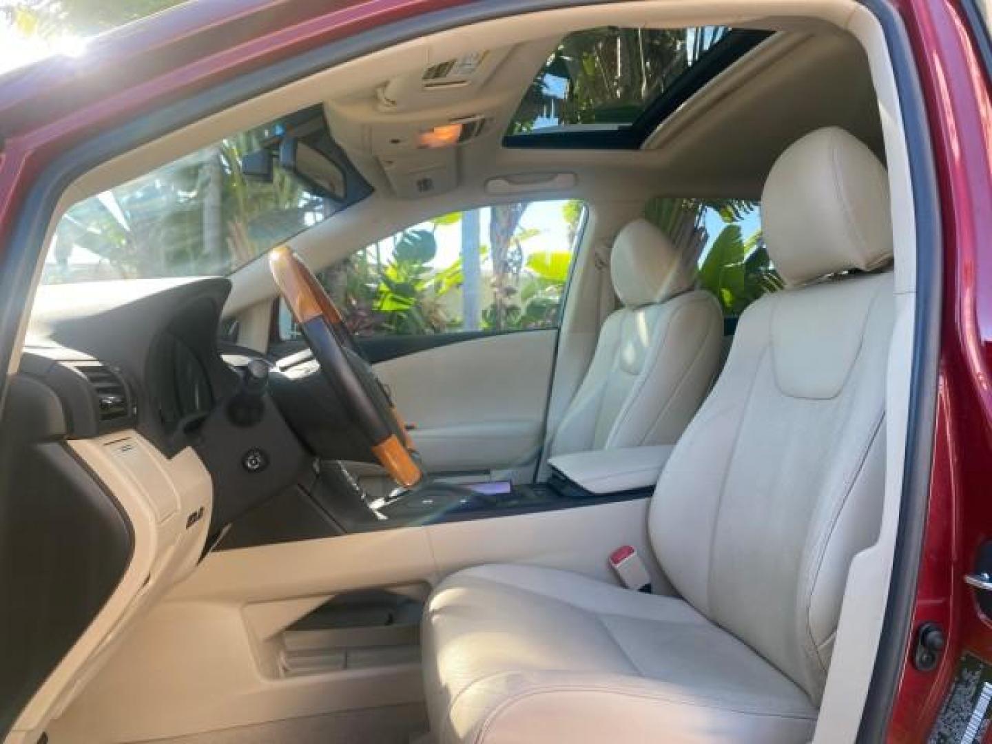 2012 Matador Red Mica /Parchment Lexus RX 350 LOW MILES 68,785 1 OWNER NAV SUV (2T2ZK1BA6CC) with an 3.5L DOHC SFI 24-Valve V6 Engine engine, Automatic transmission, located at 4701 North Dixie Hwy, Pompano Beach, FL, 33064, (954) 422-2889, 26.240938, -80.123474 - OUR WEBPAGE FLORIDACARS1.COM HAS OVER 100 PHOTOS AND FREE CARFAX LINK 2012 LEXUS RX 350 1 OWNER SUNROOF NAVIGATION LOADED VIN: 2T2ZK1BA6CC065213 2 T 2 Z K 1 B A 6 C C 0 6 5 2 1 3 4 DOOR WAGON/SPORT UTILITY 3.5L V6 F DOHC 24V GASOLINE 25 MPG FRONT WHEEL DRIVE Features A/C Seat(s) ABS Brakes Air Condi - Photo#42