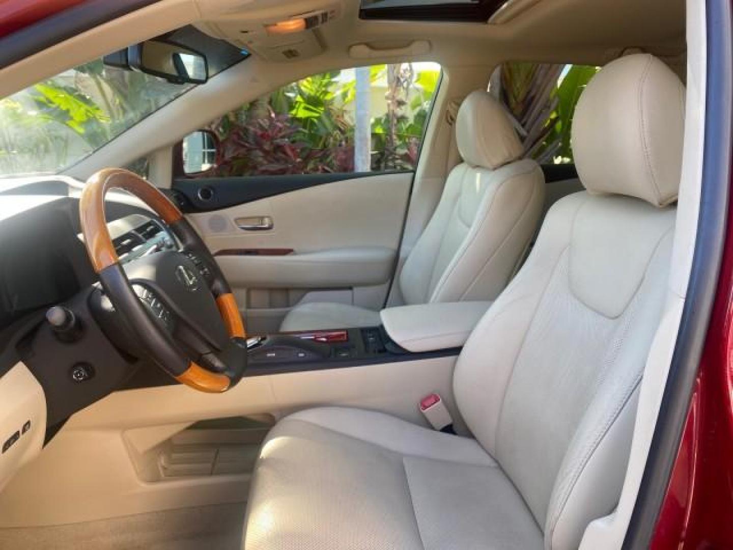 2012 Matador Red Mica /Parchment Lexus RX 350 LOW MILES 68,785 1 OWNER NAV SUV (2T2ZK1BA6CC) with an 3.5L DOHC SFI 24-Valve V6 Engine engine, Automatic transmission, located at 4701 North Dixie Hwy, Pompano Beach, FL, 33064, (954) 422-2889, 26.240938, -80.123474 - OUR WEBPAGE FLORIDACARS1.COM HAS OVER 100 PHOTOS AND FREE CARFAX LINK 2012 LEXUS RX 350 1 OWNER SUNROOF NAVIGATION LOADED VIN: 2T2ZK1BA6CC065213 2 T 2 Z K 1 B A 6 C C 0 6 5 2 1 3 4 DOOR WAGON/SPORT UTILITY 3.5L V6 F DOHC 24V GASOLINE 25 MPG FRONT WHEEL DRIVE Features A/C Seat(s) ABS Brakes Air Condi - Photo#43