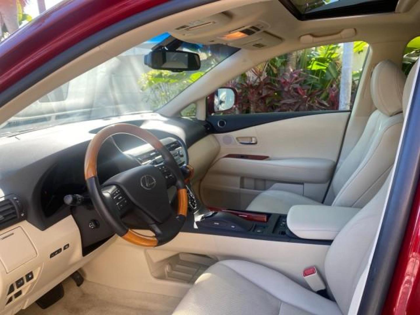 2012 Matador Red Mica /Parchment Lexus RX 350 LOW MILES 68,785 1 OWNER NAV SUV (2T2ZK1BA6CC) with an 3.5L DOHC SFI 24-Valve V6 Engine engine, Automatic transmission, located at 4701 North Dixie Hwy, Pompano Beach, FL, 33064, (954) 422-2889, 26.240938, -80.123474 - OUR WEBPAGE FLORIDACARS1.COM HAS OVER 100 PHOTOS AND FREE CARFAX LINK 2012 LEXUS RX 350 1 OWNER SUNROOF NAVIGATION LOADED VIN: 2T2ZK1BA6CC065213 2 T 2 Z K 1 B A 6 C C 0 6 5 2 1 3 4 DOOR WAGON/SPORT UTILITY 3.5L V6 F DOHC 24V GASOLINE 25 MPG FRONT WHEEL DRIVE Features A/C Seat(s) ABS Brakes Air Condi - Photo#44