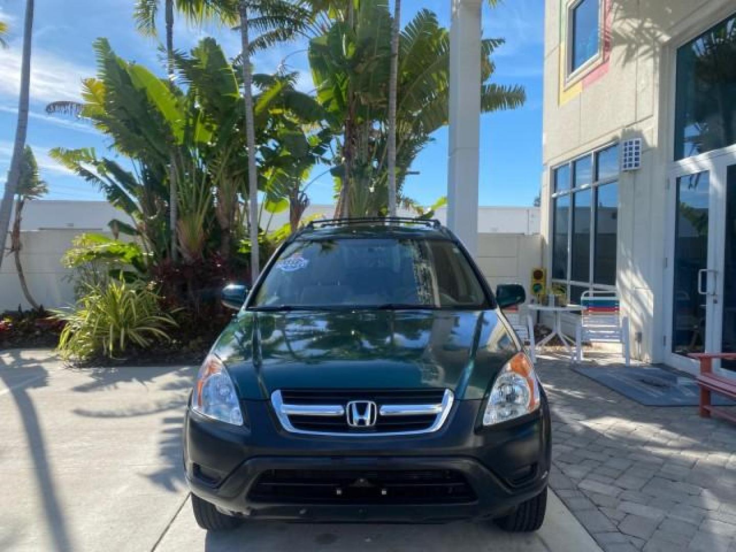2002 Clover Green Pearl /Saddle Honda CR-V EX LOW MILES 34,271 1 OWNER 4WD (JHLRD78812C) with an 2.4L DOHC i-VTEC 16-Valve I4 Engine engine, Automatic transmission, located at 4701 North Dixie Hwy, Pompano Beach, FL, 33064, (954) 422-2889, 26.240938, -80.123474 - OUR WEBPAGE FLORIDACARS1.COM HAS OVER 100 PHOTOS AND FREE CARFAX LINK 2002 HONDA CR-V EX 4WD 1 OWNER VIN: JHLRD78812C081089 J H L R D 7 8 8 1 2 C 0 8 1 0 8 9 4 DOOR WAGON/SPORT UTILITY 2.4L I4 F DOHC GASOLINE 26 MPG ALL WHEEL DRIVE Features 4WD/AWD ABS Brakes Air Conditioning Alloy Wheels AM/FM Ster - Photo#2