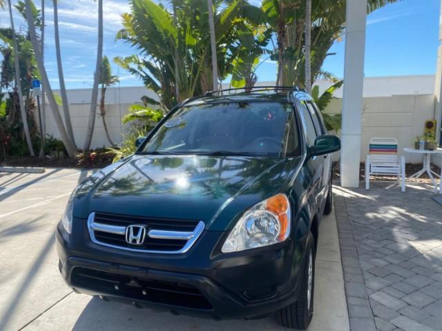 2002 Clover Green Pearl /Saddle Honda CR-V EX LOW MILES 34,271 1 OWNER 4WD (JHLRD78812C) with an 2.4L DOHC i-VTEC 16-Valve I4 Engine engine, Automatic transmission, located at 4701 North Dixie Hwy, Pompano Beach, FL, 33064, (954) 422-2889, 26.240938, -80.123474 - OUR WEBPAGE FLORIDACARS1.COM HAS OVER 100 PHOTOS AND FREE CARFAX LINK 2002 HONDA CR-V EX 4WD 1 OWNER VIN: JHLRD78812C081089 J H L R D 7 8 8 1 2 C 0 8 1 0 8 9 4 DOOR WAGON/SPORT UTILITY 2.4L I4 F DOHC GASOLINE 26 MPG ALL WHEEL DRIVE Features 4WD/AWD ABS Brakes Air Conditioning Alloy Wheels AM/FM Ster - Photo#3
