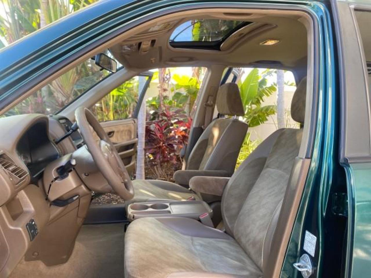 2002 Clover Green Pearl /Saddle Honda CR-V EX LOW MILES 34,271 1 OWNER 4WD (JHLRD78812C) with an 2.4L DOHC i-VTEC 16-Valve I4 Engine engine, Automatic transmission, located at 4701 North Dixie Hwy, Pompano Beach, FL, 33064, (954) 422-2889, 26.240938, -80.123474 - OUR WEBPAGE FLORIDACARS1.COM HAS OVER 100 PHOTOS AND FREE CARFAX LINK 2002 HONDA CR-V EX 4WD 1 OWNER VIN: JHLRD78812C081089 J H L R D 7 8 8 1 2 C 0 8 1 0 8 9 4 DOOR WAGON/SPORT UTILITY 2.4L I4 F DOHC GASOLINE 26 MPG ALL WHEEL DRIVE Features 4WD/AWD ABS Brakes Air Conditioning Alloy Wheels AM/FM Ster - Photo#10