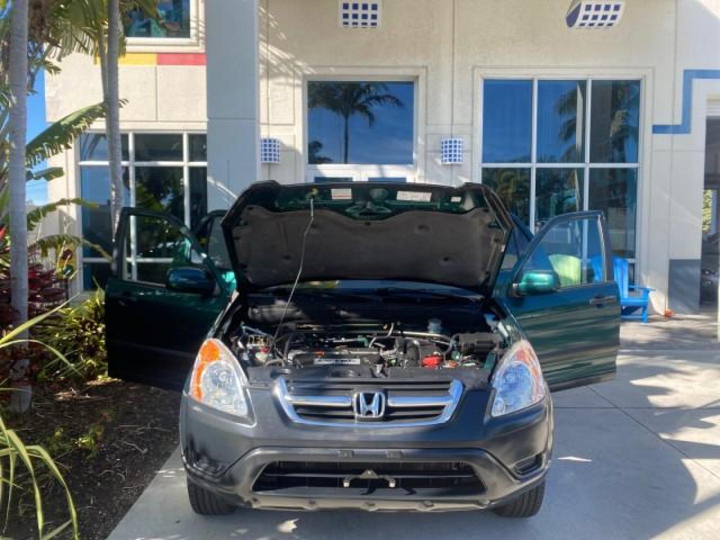 2002 Clover Green Pearl /Saddle Honda CR-V EX LOW MILES 34,271 1 OWNER 4WD (JHLRD78812C) with an 2.4L DOHC i-VTEC 16-Valve I4 Engine engine, Automatic transmission, located at 4701 North Dixie Hwy, Pompano Beach, FL, 33064, (954) 422-2889, 26.240938, -80.123474 - OUR WEBPAGE FLORIDACARS1.COM HAS OVER 100 PHOTOS AND FREE CARFAX LINK 2002 HONDA CR-V EX 4WD 1 OWNER VIN: JHLRD78812C081089 J H L R D 7 8 8 1 2 C 0 8 1 0 8 9 4 DOOR WAGON/SPORT UTILITY 2.4L I4 F DOHC GASOLINE 26 MPG ALL WHEEL DRIVE Features 4WD/AWD ABS Brakes Air Conditioning Alloy Wheels AM/FM Ster - Photo#17