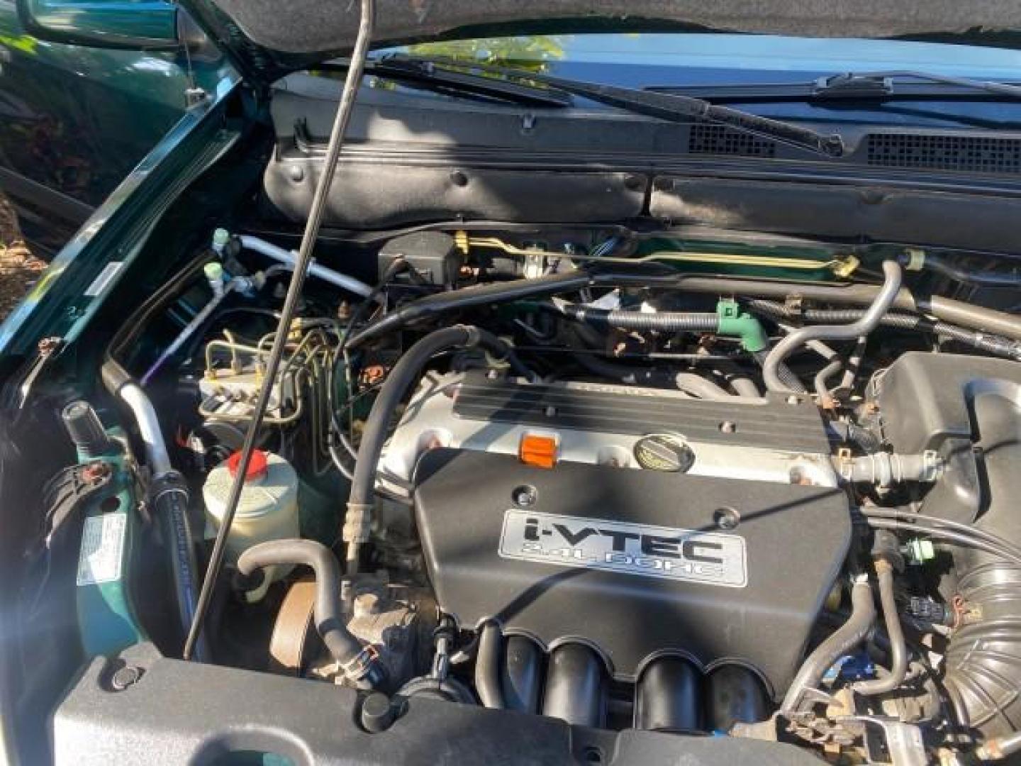 2002 Clover Green Pearl /Saddle Honda CR-V EX LOW MILES 34,271 1 OWNER 4WD (JHLRD78812C) with an 2.4L DOHC i-VTEC 16-Valve I4 Engine engine, Automatic transmission, located at 4701 North Dixie Hwy, Pompano Beach, FL, 33064, (954) 422-2889, 26.240938, -80.123474 - OUR WEBPAGE FLORIDACARS1.COM HAS OVER 100 PHOTOS AND FREE CARFAX LINK 2002 HONDA CR-V EX 4WD 1 OWNER VIN: JHLRD78812C081089 J H L R D 7 8 8 1 2 C 0 8 1 0 8 9 4 DOOR WAGON/SPORT UTILITY 2.4L I4 F DOHC GASOLINE 26 MPG ALL WHEEL DRIVE Features 4WD/AWD ABS Brakes Air Conditioning Alloy Wheels AM/FM Ster - Photo#24