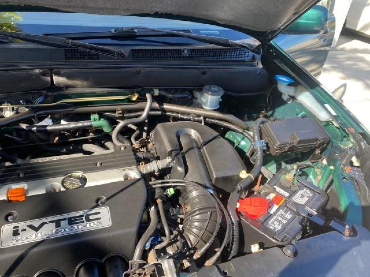 2002 Clover Green Pearl /Saddle Honda CR-V EX LOW MILES 34,271 1 OWNER 4WD (JHLRD78812C) with an 2.4L DOHC i-VTEC 16-Valve I4 Engine engine, Automatic transmission, located at 4701 North Dixie Hwy, Pompano Beach, FL, 33064, (954) 422-2889, 26.240938, -80.123474 - OUR WEBPAGE FLORIDACARS1.COM HAS OVER 100 PHOTOS AND FREE CARFAX LINK 2002 HONDA CR-V EX 4WD 1 OWNER VIN: JHLRD78812C081089 J H L R D 7 8 8 1 2 C 0 8 1 0 8 9 4 DOOR WAGON/SPORT UTILITY 2.4L I4 F DOHC GASOLINE 26 MPG ALL WHEEL DRIVE Features 4WD/AWD ABS Brakes Air Conditioning Alloy Wheels AM/FM Ster - Photo#25