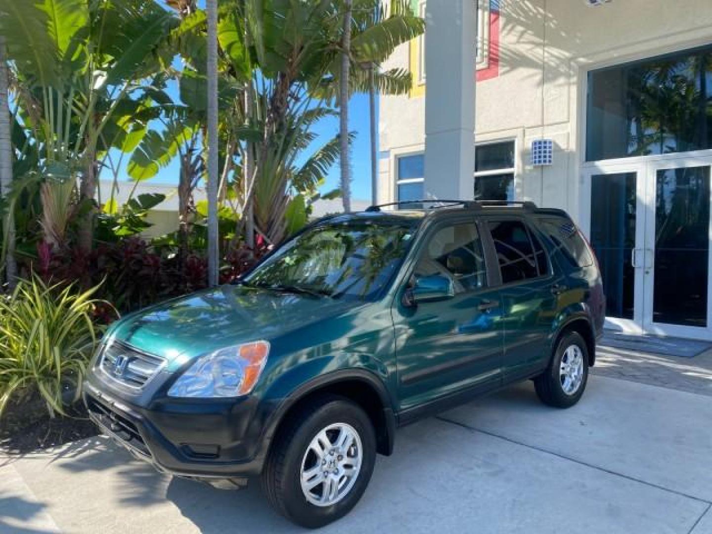 2002 Clover Green Pearl /Saddle Honda CR-V EX LOW MILES 34,271 1 OWNER 4WD (JHLRD78812C) with an 2.4L DOHC i-VTEC 16-Valve I4 Engine engine, Automatic transmission, located at 4701 North Dixie Hwy, Pompano Beach, FL, 33064, (954) 422-2889, 26.240938, -80.123474 - OUR WEBPAGE FLORIDACARS1.COM HAS OVER 100 PHOTOS AND FREE CARFAX LINK 2002 HONDA CR-V EX 4WD 1 OWNER VIN: JHLRD78812C081089 J H L R D 7 8 8 1 2 C 0 8 1 0 8 9 4 DOOR WAGON/SPORT UTILITY 2.4L I4 F DOHC GASOLINE 26 MPG ALL WHEEL DRIVE Features 4WD/AWD ABS Brakes Air Conditioning Alloy Wheels AM/FM Ster - Photo#29