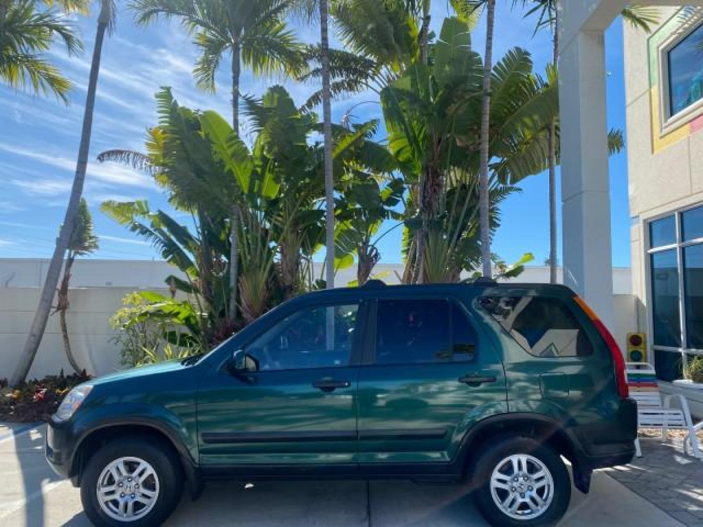 2002 Clover Green Pearl /Saddle Honda CR-V EX LOW MILES 34,271 1 OWNER 4WD (JHLRD78812C) with an 2.4L DOHC i-VTEC 16-Valve I4 Engine engine, Automatic transmission, located at 4701 North Dixie Hwy, Pompano Beach, FL, 33064, (954) 422-2889, 26.240938, -80.123474 - OUR WEBPAGE FLORIDACARS1.COM HAS OVER 100 PHOTOS AND FREE CARFAX LINK 2002 HONDA CR-V EX 4WD 1 OWNER VIN: JHLRD78812C081089 J H L R D 7 8 8 1 2 C 0 8 1 0 8 9 4 DOOR WAGON/SPORT UTILITY 2.4L I4 F DOHC GASOLINE 26 MPG ALL WHEEL DRIVE Features 4WD/AWD ABS Brakes Air Conditioning Alloy Wheels AM/FM Ster - Photo#30