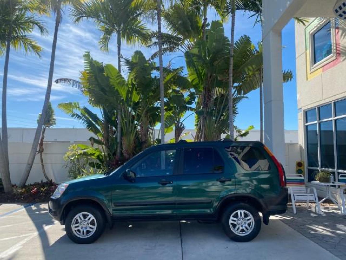 2002 Clover Green Pearl /Saddle Honda CR-V EX LOW MILES 34,271 1 OWNER 4WD (JHLRD78812C) with an 2.4L DOHC i-VTEC 16-Valve I4 Engine engine, Automatic transmission, located at 4701 North Dixie Hwy, Pompano Beach, FL, 33064, (954) 422-2889, 26.240938, -80.123474 - OUR WEBPAGE FLORIDACARS1.COM HAS OVER 100 PHOTOS AND FREE CARFAX LINK 2002 HONDA CR-V EX 4WD 1 OWNER VIN: JHLRD78812C081089 J H L R D 7 8 8 1 2 C 0 8 1 0 8 9 4 DOOR WAGON/SPORT UTILITY 2.4L I4 F DOHC GASOLINE 26 MPG ALL WHEEL DRIVE Features 4WD/AWD ABS Brakes Air Conditioning Alloy Wheels AM/FM Ster - Photo#32