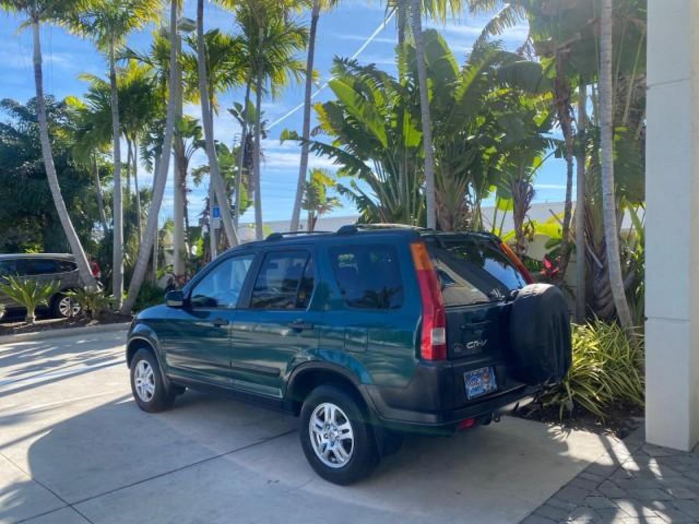 2002 Clover Green Pearl /Saddle Honda CR-V EX LOW MILES 34,271 1 OWNER 4WD (JHLRD78812C) with an 2.4L DOHC i-VTEC 16-Valve I4 Engine engine, Automatic transmission, located at 4701 North Dixie Hwy, Pompano Beach, FL, 33064, (954) 422-2889, 26.240938, -80.123474 - OUR WEBPAGE FLORIDACARS1.COM HAS OVER 100 PHOTOS AND FREE CARFAX LINK 2002 HONDA CR-V EX 4WD 1 OWNER VIN: JHLRD78812C081089 J H L R D 7 8 8 1 2 C 0 8 1 0 8 9 4 DOOR WAGON/SPORT UTILITY 2.4L I4 F DOHC GASOLINE 26 MPG ALL WHEEL DRIVE Features 4WD/AWD ABS Brakes Air Conditioning Alloy Wheels AM/FM Ster - Photo#33