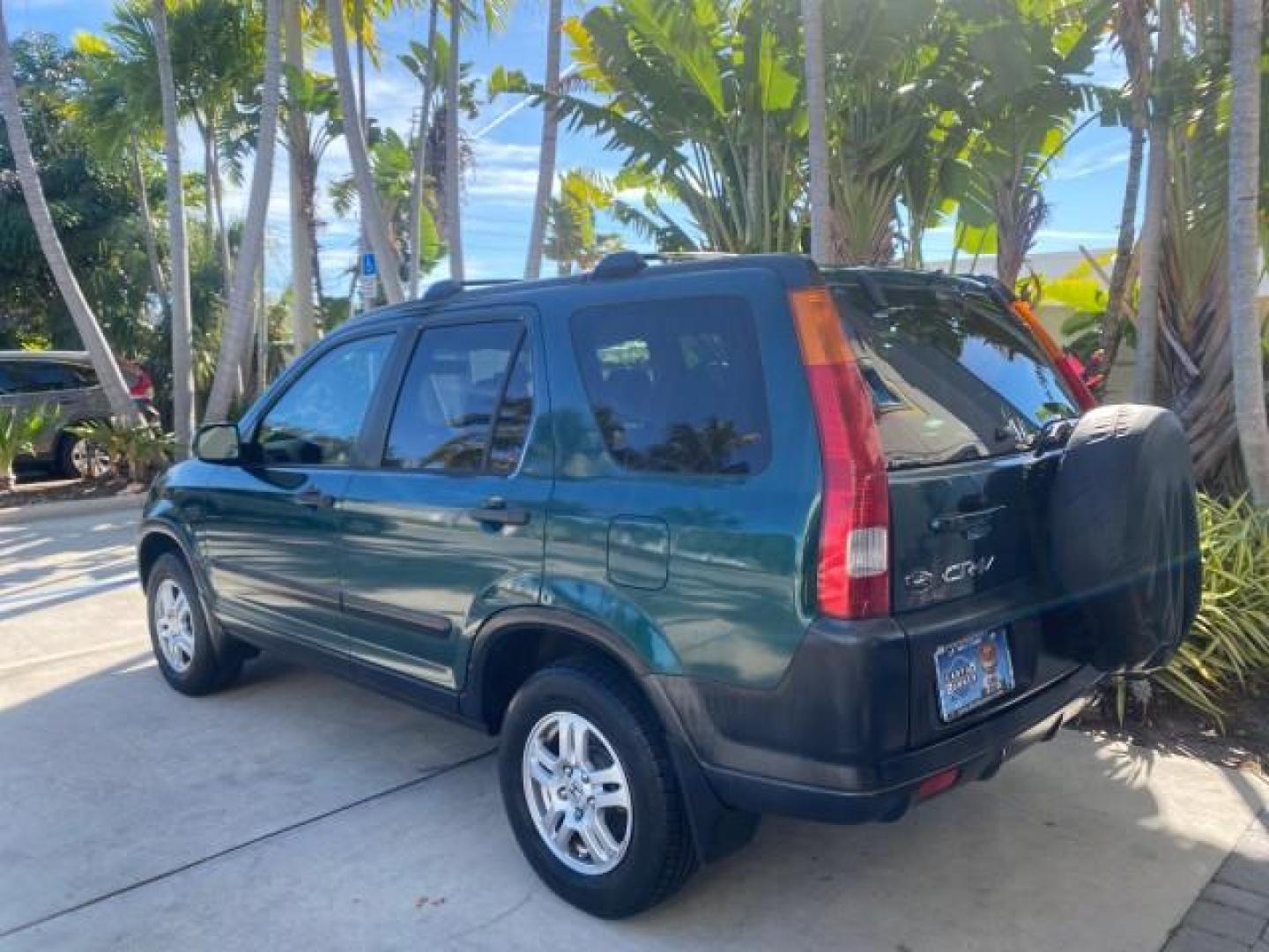 2002 Clover Green Pearl /Saddle Honda CR-V EX LOW MILES 34,271 1 OWNER 4WD (JHLRD78812C) with an 2.4L DOHC i-VTEC 16-Valve I4 Engine engine, Automatic transmission, located at 4701 North Dixie Hwy, Pompano Beach, FL, 33064, (954) 422-2889, 26.240938, -80.123474 - OUR WEBPAGE FLORIDACARS1.COM HAS OVER 100 PHOTOS AND FREE CARFAX LINK 2002 HONDA CR-V EX 4WD 1 OWNER VIN: JHLRD78812C081089 J H L R D 7 8 8 1 2 C 0 8 1 0 8 9 4 DOOR WAGON/SPORT UTILITY 2.4L I4 F DOHC GASOLINE 26 MPG ALL WHEEL DRIVE Features 4WD/AWD ABS Brakes Air Conditioning Alloy Wheels AM/FM Ster - Photo#34