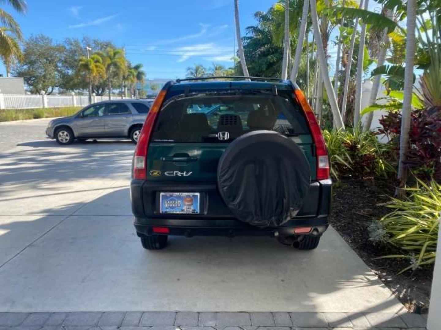2002 Clover Green Pearl /Saddle Honda CR-V EX LOW MILES 34,271 1 OWNER 4WD (JHLRD78812C) with an 2.4L DOHC i-VTEC 16-Valve I4 Engine engine, Automatic transmission, located at 4701 North Dixie Hwy, Pompano Beach, FL, 33064, (954) 422-2889, 26.240938, -80.123474 - OUR WEBPAGE FLORIDACARS1.COM HAS OVER 100 PHOTOS AND FREE CARFAX LINK 2002 HONDA CR-V EX 4WD 1 OWNER VIN: JHLRD78812C081089 J H L R D 7 8 8 1 2 C 0 8 1 0 8 9 4 DOOR WAGON/SPORT UTILITY 2.4L I4 F DOHC GASOLINE 26 MPG ALL WHEEL DRIVE Features 4WD/AWD ABS Brakes Air Conditioning Alloy Wheels AM/FM Ster - Photo#35