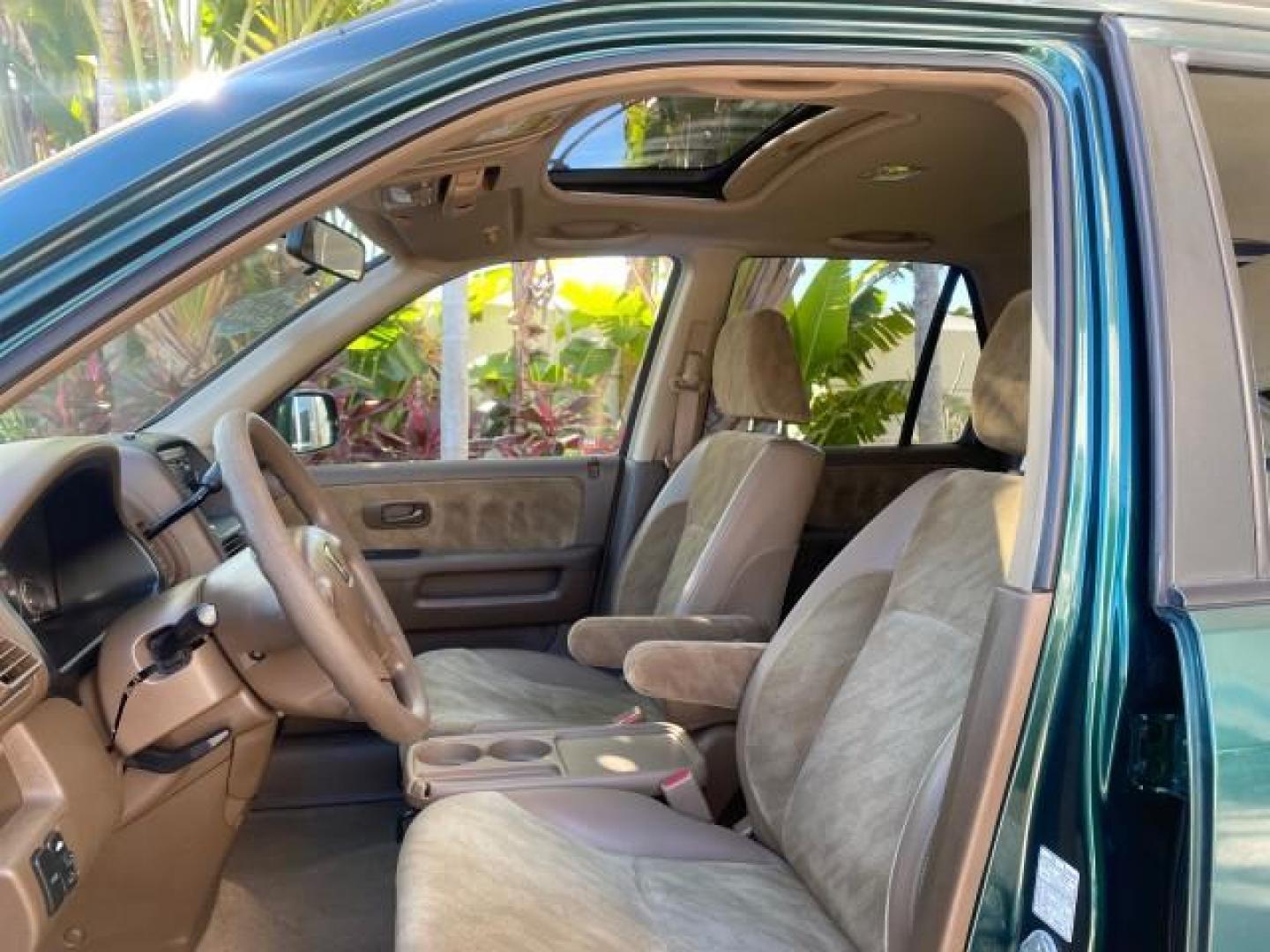 2002 Clover Green Pearl /Saddle Honda CR-V EX LOW MILES 34,271 1 OWNER 4WD (JHLRD78812C) with an 2.4L DOHC i-VTEC 16-Valve I4 Engine engine, Automatic transmission, located at 4701 North Dixie Hwy, Pompano Beach, FL, 33064, (954) 422-2889, 26.240938, -80.123474 - OUR WEBPAGE FLORIDACARS1.COM HAS OVER 100 PHOTOS AND FREE CARFAX LINK 2002 HONDA CR-V EX 4WD 1 OWNER VIN: JHLRD78812C081089 J H L R D 7 8 8 1 2 C 0 8 1 0 8 9 4 DOOR WAGON/SPORT UTILITY 2.4L I4 F DOHC GASOLINE 26 MPG ALL WHEEL DRIVE Features 4WD/AWD ABS Brakes Air Conditioning Alloy Wheels AM/FM Ster - Photo#43