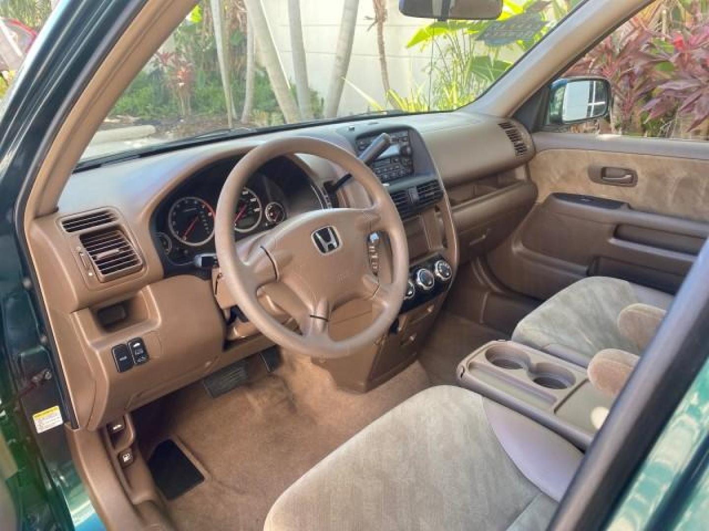 2002 Clover Green Pearl /Saddle Honda CR-V EX LOW MILES 34,271 1 OWNER 4WD (JHLRD78812C) with an 2.4L DOHC i-VTEC 16-Valve I4 Engine engine, Automatic transmission, located at 4701 North Dixie Hwy, Pompano Beach, FL, 33064, (954) 422-2889, 26.240938, -80.123474 - OUR WEBPAGE FLORIDACARS1.COM HAS OVER 100 PHOTOS AND FREE CARFAX LINK 2002 HONDA CR-V EX 4WD 1 OWNER VIN: JHLRD78812C081089 J H L R D 7 8 8 1 2 C 0 8 1 0 8 9 4 DOOR WAGON/SPORT UTILITY 2.4L I4 F DOHC GASOLINE 26 MPG ALL WHEEL DRIVE Features 4WD/AWD ABS Brakes Air Conditioning Alloy Wheels AM/FM Ster - Photo#46