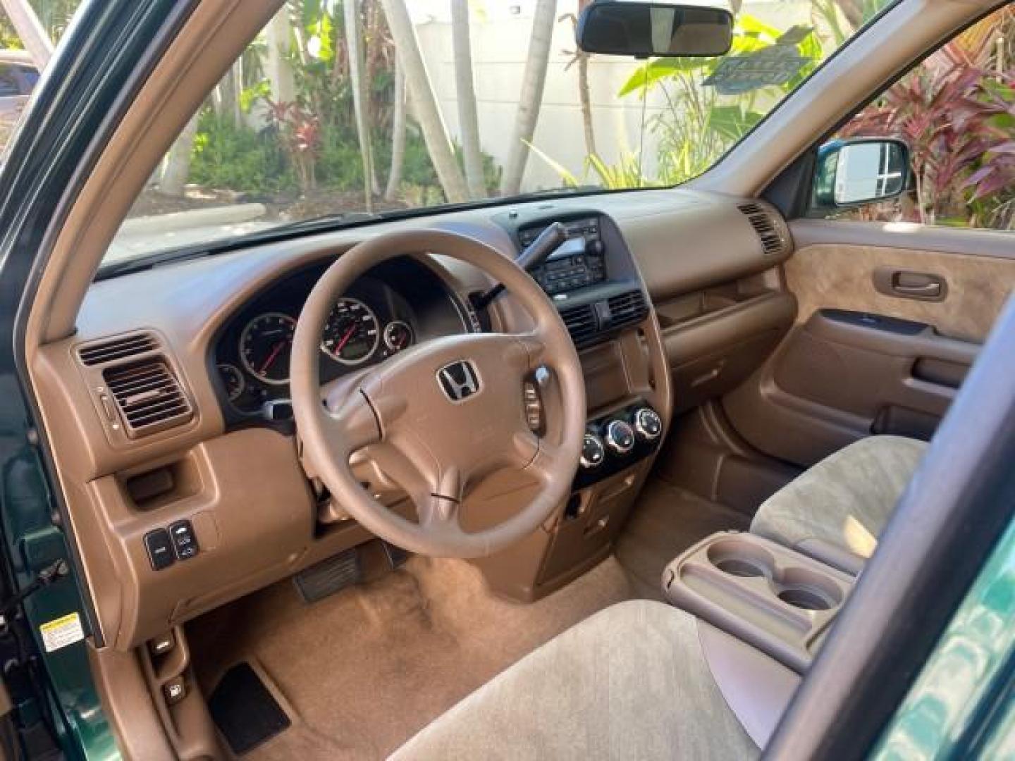 2002 Clover Green Pearl /Saddle Honda CR-V EX LOW MILES 34,271 1 OWNER 4WD (JHLRD78812C) with an 2.4L DOHC i-VTEC 16-Valve I4 Engine engine, Automatic transmission, located at 4701 North Dixie Hwy, Pompano Beach, FL, 33064, (954) 422-2889, 26.240938, -80.123474 - OUR WEBPAGE FLORIDACARS1.COM HAS OVER 100 PHOTOS AND FREE CARFAX LINK 2002 HONDA CR-V EX 4WD 1 OWNER VIN: JHLRD78812C081089 J H L R D 7 8 8 1 2 C 0 8 1 0 8 9 4 DOOR WAGON/SPORT UTILITY 2.4L I4 F DOHC GASOLINE 26 MPG ALL WHEEL DRIVE Features 4WD/AWD ABS Brakes Air Conditioning Alloy Wheels AM/FM Ster - Photo#47