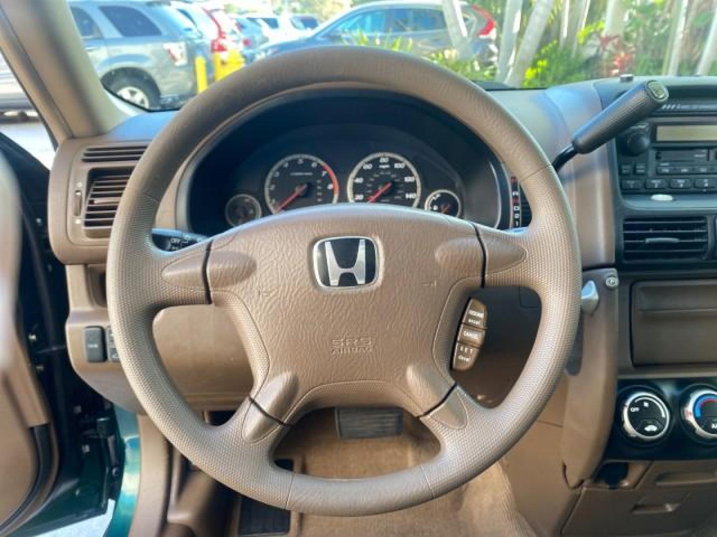 2002 Clover Green Pearl /Saddle Honda CR-V EX LOW MILES 34,271 1 OWNER 4WD (JHLRD78812C) with an 2.4L DOHC i-VTEC 16-Valve I4 Engine engine, Automatic transmission, located at 4701 North Dixie Hwy, Pompano Beach, FL, 33064, (954) 422-2889, 26.240938, -80.123474 - OUR WEBPAGE FLORIDACARS1.COM HAS OVER 100 PHOTOS AND FREE CARFAX LINK 2002 HONDA CR-V EX 4WD 1 OWNER VIN: JHLRD78812C081089 J H L R D 7 8 8 1 2 C 0 8 1 0 8 9 4 DOOR WAGON/SPORT UTILITY 2.4L I4 F DOHC GASOLINE 26 MPG ALL WHEEL DRIVE Features 4WD/AWD ABS Brakes Air Conditioning Alloy Wheels AM/FM Ster - Photo#48