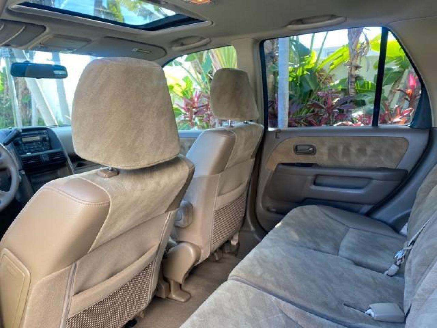 2002 Clover Green Pearl /Saddle Honda CR-V EX LOW MILES 34,271 1 OWNER 4WD (JHLRD78812C) with an 2.4L DOHC i-VTEC 16-Valve I4 Engine engine, Automatic transmission, located at 4701 North Dixie Hwy, Pompano Beach, FL, 33064, (954) 422-2889, 26.240938, -80.123474 - OUR WEBPAGE FLORIDACARS1.COM HAS OVER 100 PHOTOS AND FREE CARFAX LINK 2002 HONDA CR-V EX 4WD 1 OWNER VIN: JHLRD78812C081089 J H L R D 7 8 8 1 2 C 0 8 1 0 8 9 4 DOOR WAGON/SPORT UTILITY 2.4L I4 F DOHC GASOLINE 26 MPG ALL WHEEL DRIVE Features 4WD/AWD ABS Brakes Air Conditioning Alloy Wheels AM/FM Ster - Photo#78
