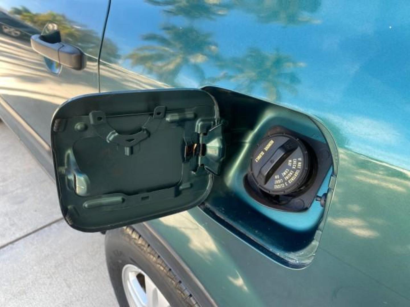 2002 Clover Green Pearl /Saddle Honda CR-V EX LOW MILES 34,271 1 OWNER 4WD (JHLRD78812C) with an 2.4L DOHC i-VTEC 16-Valve I4 Engine engine, Automatic transmission, located at 4701 North Dixie Hwy, Pompano Beach, FL, 33064, (954) 422-2889, 26.240938, -80.123474 - OUR WEBPAGE FLORIDACARS1.COM HAS OVER 100 PHOTOS AND FREE CARFAX LINK 2002 HONDA CR-V EX 4WD 1 OWNER VIN: JHLRD78812C081089 J H L R D 7 8 8 1 2 C 0 8 1 0 8 9 4 DOOR WAGON/SPORT UTILITY 2.4L I4 F DOHC GASOLINE 26 MPG ALL WHEEL DRIVE Features 4WD/AWD ABS Brakes Air Conditioning Alloy Wheels AM/FM Ster - Photo#88