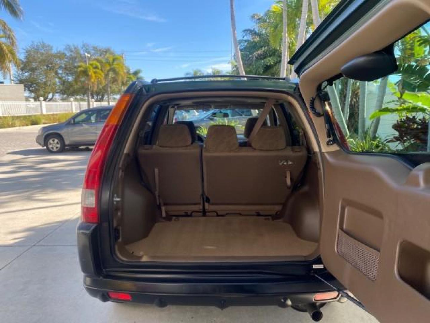 2002 Clover Green Pearl /Saddle Honda CR-V EX LOW MILES 34,271 1 OWNER 4WD (JHLRD78812C) with an 2.4L DOHC i-VTEC 16-Valve I4 Engine engine, Automatic transmission, located at 4701 North Dixie Hwy, Pompano Beach, FL, 33064, (954) 422-2889, 26.240938, -80.123474 - OUR WEBPAGE FLORIDACARS1.COM HAS OVER 100 PHOTOS AND FREE CARFAX LINK 2002 HONDA CR-V EX 4WD 1 OWNER VIN: JHLRD78812C081089 J H L R D 7 8 8 1 2 C 0 8 1 0 8 9 4 DOOR WAGON/SPORT UTILITY 2.4L I4 F DOHC GASOLINE 26 MPG ALL WHEEL DRIVE Features 4WD/AWD ABS Brakes Air Conditioning Alloy Wheels AM/FM Ster - Photo#94
