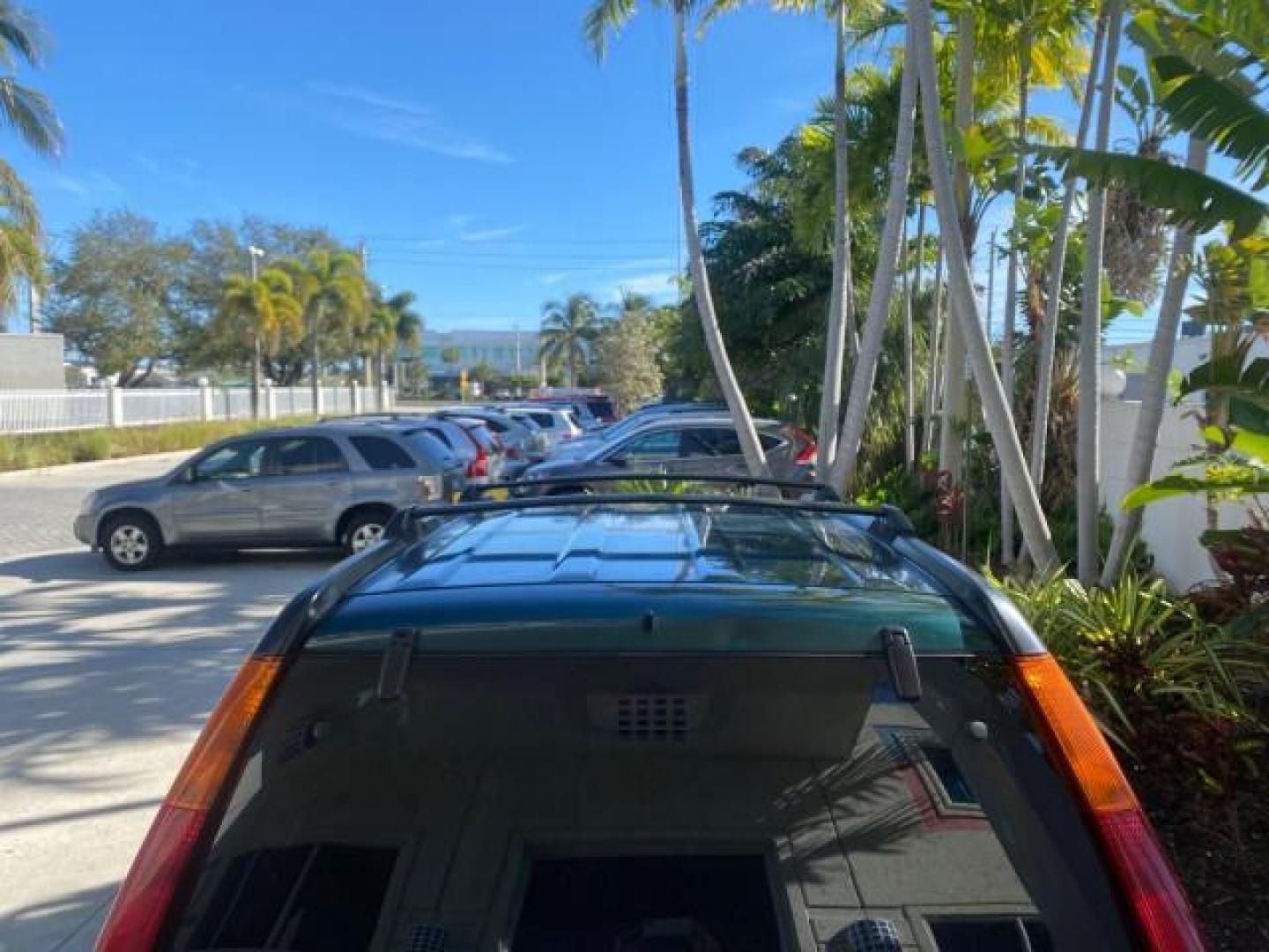 2002 Clover Green Pearl /Saddle Honda CR-V EX LOW MILES 34,271 1 OWNER 4WD (JHLRD78812C) with an 2.4L DOHC i-VTEC 16-Valve I4 Engine engine, Automatic transmission, located at 4701 North Dixie Hwy, Pompano Beach, FL, 33064, (954) 422-2889, 26.240938, -80.123474 - OUR WEBPAGE FLORIDACARS1.COM HAS OVER 100 PHOTOS AND FREE CARFAX LINK 2002 HONDA CR-V EX 4WD 1 OWNER VIN: JHLRD78812C081089 J H L R D 7 8 8 1 2 C 0 8 1 0 8 9 4 DOOR WAGON/SPORT UTILITY 2.4L I4 F DOHC GASOLINE 26 MPG ALL WHEEL DRIVE Features 4WD/AWD ABS Brakes Air Conditioning Alloy Wheels AM/FM Ster - Photo#99