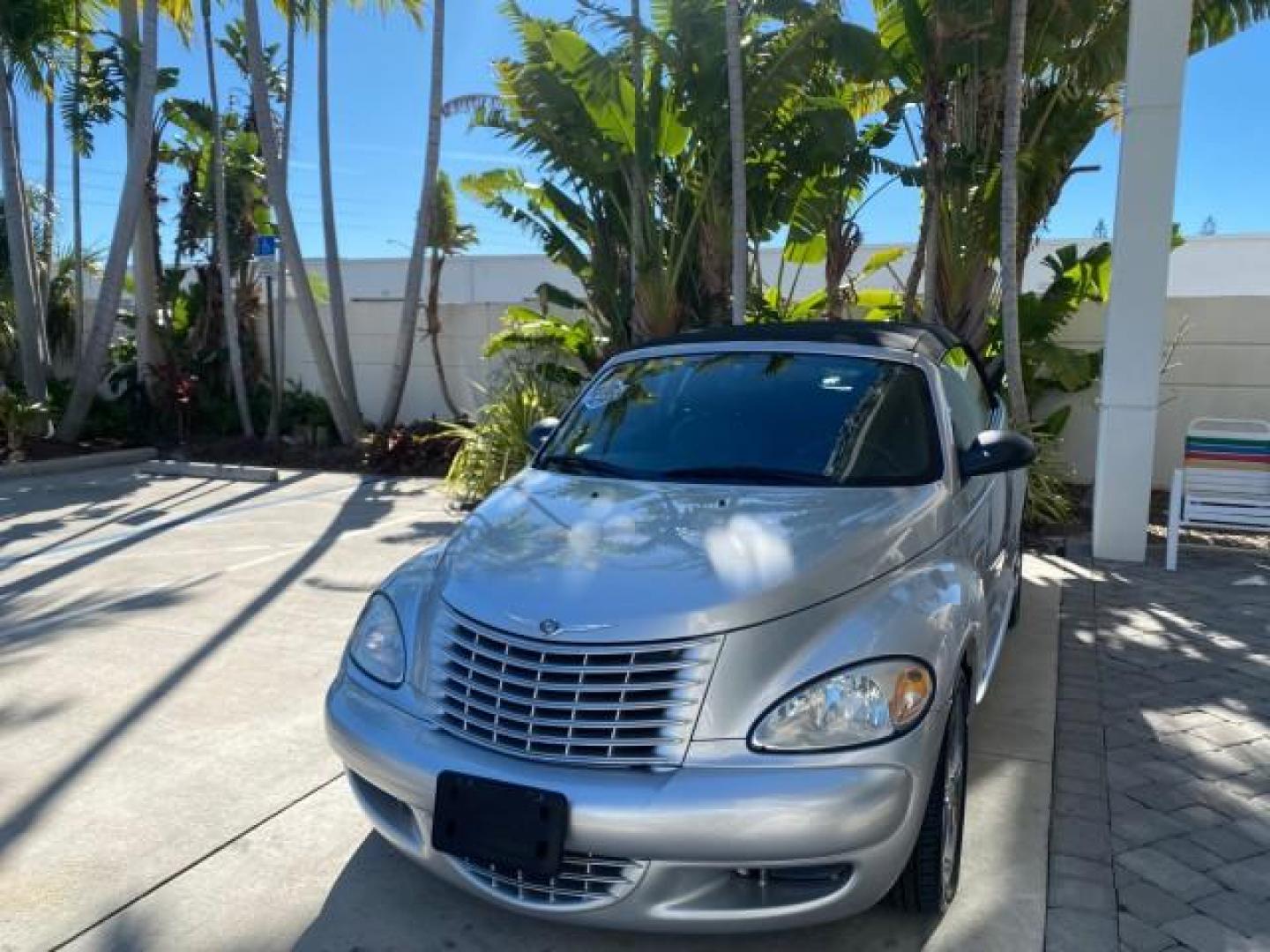 2005 Bright Silver Metallic /Dark Slate Gray Chrysler PT Cruiser GT LOW MILES 35,037 1 OWNER (3C3AY75S15T) with an 2.4L DOHC 16-Valve HO Turbo I4 Engine engine, Automatic transmission, located at 4701 North Dixie Hwy, Pompano Beach, FL, 33064, (954) 422-2889, 26.240938, -80.123474 - OUR WEBPAGE FLORIDACARS1.COM HAS OVER 100 PHOTOS AND FREE CARFAX LINK 2005 CHRYSLER PT CRUISER GT 1 OWNER VIN: 3C3AY75S15T362031 3 C 3 A Y 7 5 S 1 5 T 3 6 2 0 3 1 CONVERTIBLE 2.4L I4 F DOHC 16V GASOLINE 27 MPG FRONT WHEEL DRIVE Features ABS Brakes Air Conditioning Alloy Wheels AM/FM Stereo Automatic - Photo#3
