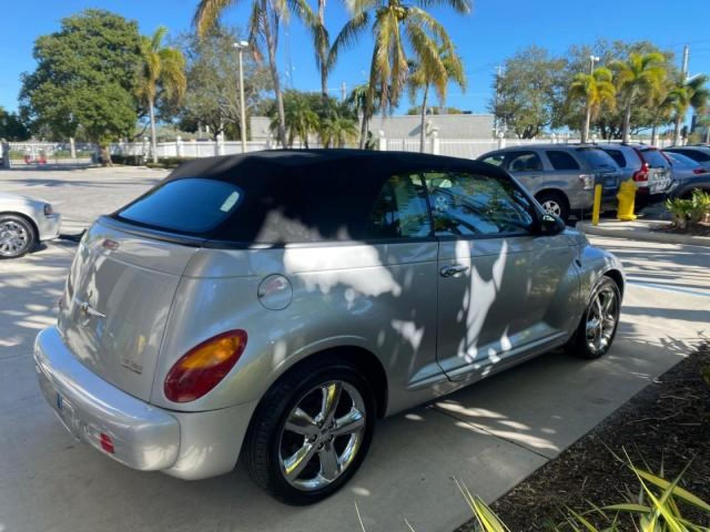 2005 Bright Silver Metallic /Dark Slate Gray Chrysler PT Cruiser GT LOW MILES 35,037 1 OWNER (3C3AY75S15T) with an 2.4L DOHC 16-Valve HO Turbo I4 Engine engine, Automatic transmission, located at 4701 North Dixie Hwy, Pompano Beach, FL, 33064, (954) 422-2889, 26.240938, -80.123474 - OUR WEBPAGE FLORIDACARS1.COM HAS OVER 100 PHOTOS AND FREE CARFAX LINK 2005 CHRYSLER PT CRUISER GT 1 OWNER VIN: 3C3AY75S15T362031 3 C 3 A Y 7 5 S 1 5 T 3 6 2 0 3 1 CONVERTIBLE 2.4L I4 F DOHC 16V GASOLINE 27 MPG FRONT WHEEL DRIVE Features ABS Brakes Air Conditioning Alloy Wheels AM/FM Stereo Automatic - Photo#7