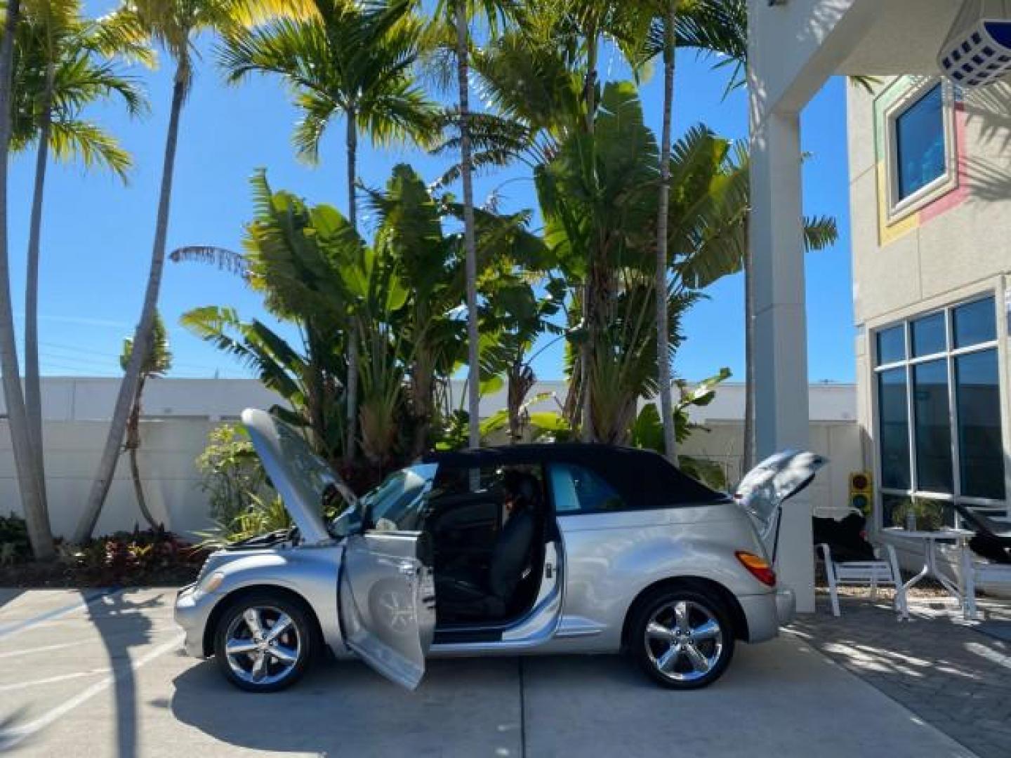 2005 Bright Silver Metallic /Dark Slate Gray Chrysler PT Cruiser GT LOW MILES 35,037 1 OWNER (3C3AY75S15T) with an 2.4L DOHC 16-Valve HO Turbo I4 Engine engine, Automatic transmission, located at 4701 North Dixie Hwy, Pompano Beach, FL, 33064, (954) 422-2889, 26.240938, -80.123474 - OUR WEBPAGE FLORIDACARS1.COM HAS OVER 100 PHOTOS AND FREE CARFAX LINK 2005 CHRYSLER PT CRUISER GT 1 OWNER VIN: 3C3AY75S15T362031 3 C 3 A Y 7 5 S 1 5 T 3 6 2 0 3 1 CONVERTIBLE 2.4L I4 F DOHC 16V GASOLINE 27 MPG FRONT WHEEL DRIVE Features ABS Brakes Air Conditioning Alloy Wheels AM/FM Stereo Automatic - Photo#8
