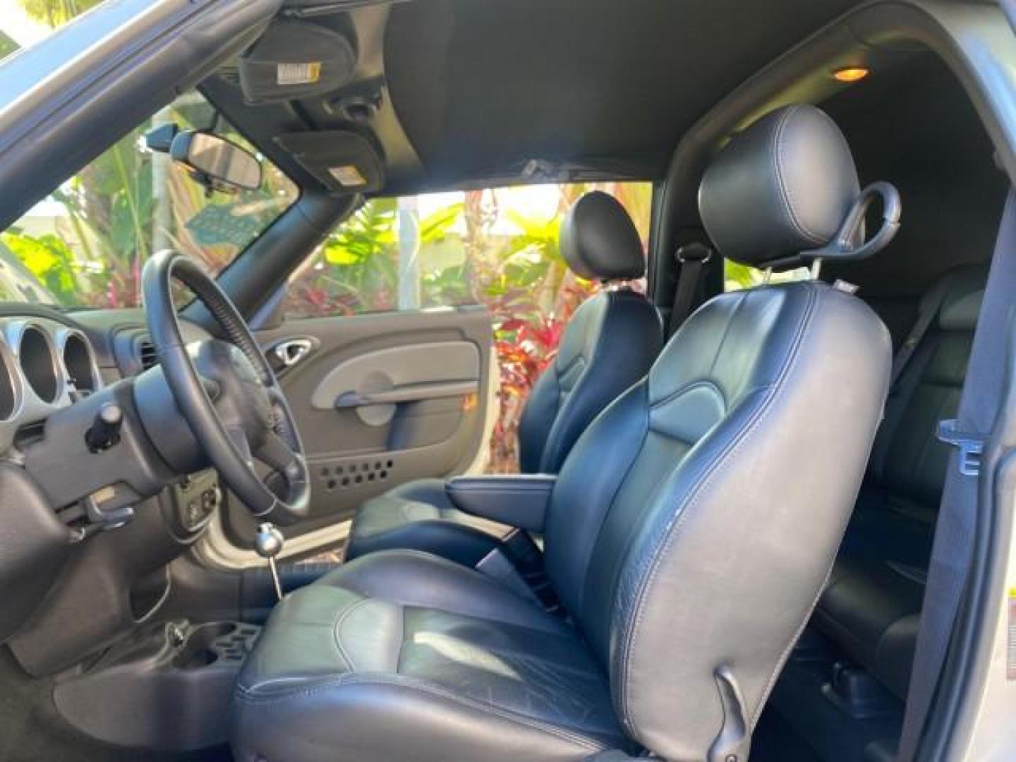 2005 Bright Silver Metallic /Dark Slate Gray Chrysler PT Cruiser GT LOW MILES 35,037 1 OWNER (3C3AY75S15T) with an 2.4L DOHC 16-Valve HO Turbo I4 Engine engine, Automatic transmission, located at 4701 North Dixie Hwy, Pompano Beach, FL, 33064, (954) 422-2889, 26.240938, -80.123474 - OUR WEBPAGE FLORIDACARS1.COM HAS OVER 100 PHOTOS AND FREE CARFAX LINK 2005 CHRYSLER PT CRUISER GT 1 OWNER VIN: 3C3AY75S15T362031 3 C 3 A Y 7 5 S 1 5 T 3 6 2 0 3 1 CONVERTIBLE 2.4L I4 F DOHC 16V GASOLINE 27 MPG FRONT WHEEL DRIVE Features ABS Brakes Air Conditioning Alloy Wheels AM/FM Stereo Automatic - Photo#10