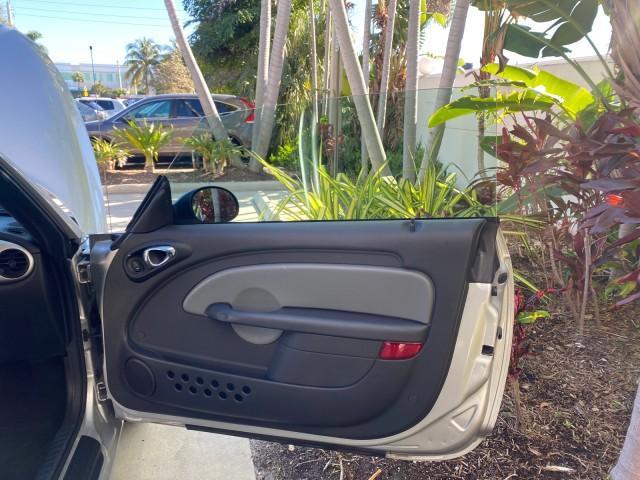 2005 Bright Silver Metallic /Dark Slate Gray Chrysler PT Cruiser GT LOW MILES 35,037 1 OWNER (3C3AY75S15T) with an 2.4L DOHC 16-Valve HO Turbo I4 Engine engine, Automatic transmission, located at 4701 North Dixie Hwy, Pompano Beach, FL, 33064, (954) 422-2889, 26.240938, -80.123474 - OUR WEBPAGE FLORIDACARS1.COM HAS OVER 100 PHOTOS AND FREE CARFAX LINK 2005 CHRYSLER PT CRUISER GT 1 OWNER VIN: 3C3AY75S15T362031 3 C 3 A Y 7 5 S 1 5 T 3 6 2 0 3 1 CONVERTIBLE 2.4L I4 F DOHC 16V GASOLINE 27 MPG FRONT WHEEL DRIVE Features ABS Brakes Air Conditioning Alloy Wheels AM/FM Stereo Automatic - Photo#11