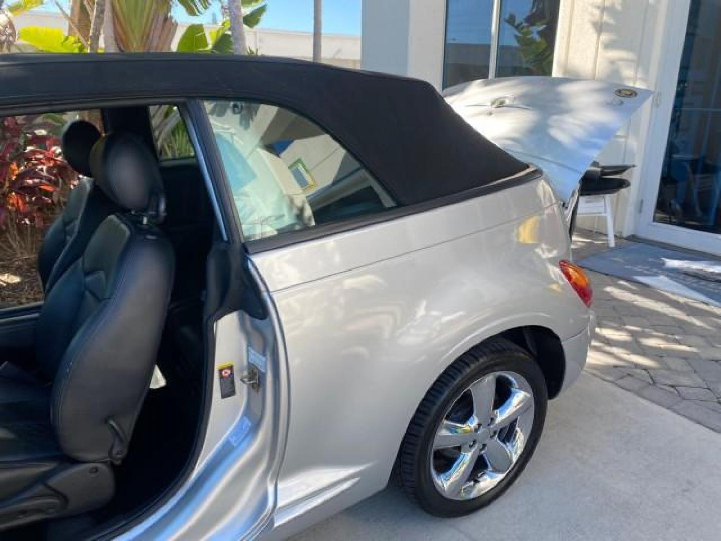 2005 Bright Silver Metallic /Dark Slate Gray Chrysler PT Cruiser GT LOW MILES 35,037 1 OWNER (3C3AY75S15T) with an 2.4L DOHC 16-Valve HO Turbo I4 Engine engine, Automatic transmission, located at 4701 North Dixie Hwy, Pompano Beach, FL, 33064, (954) 422-2889, 26.240938, -80.123474 - OUR WEBPAGE FLORIDACARS1.COM HAS OVER 100 PHOTOS AND FREE CARFAX LINK 2005 CHRYSLER PT CRUISER GT 1 OWNER VIN: 3C3AY75S15T362031 3 C 3 A Y 7 5 S 1 5 T 3 6 2 0 3 1 CONVERTIBLE 2.4L I4 F DOHC 16V GASOLINE 27 MPG FRONT WHEEL DRIVE Features ABS Brakes Air Conditioning Alloy Wheels AM/FM Stereo Automatic - Photo#13