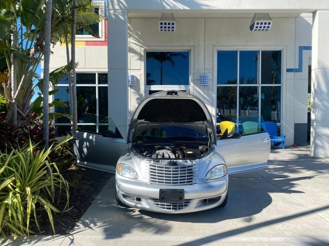 2005 Bright Silver Metallic /Dark Slate Gray Chrysler PT Cruiser GT LOW MILES 35,037 1 OWNER (3C3AY75S15T) with an 2.4L DOHC 16-Valve HO Turbo I4 Engine engine, Automatic transmission, located at 4701 North Dixie Hwy, Pompano Beach, FL, 33064, (954) 422-2889, 26.240938, -80.123474 - OUR WEBPAGE FLORIDACARS1.COM HAS OVER 100 PHOTOS AND FREE CARFAX LINK 2005 CHRYSLER PT CRUISER GT 1 OWNER VIN: 3C3AY75S15T362031 3 C 3 A Y 7 5 S 1 5 T 3 6 2 0 3 1 CONVERTIBLE 2.4L I4 F DOHC 16V GASOLINE 27 MPG FRONT WHEEL DRIVE Features ABS Brakes Air Conditioning Alloy Wheels AM/FM Stereo Automatic - Photo#16