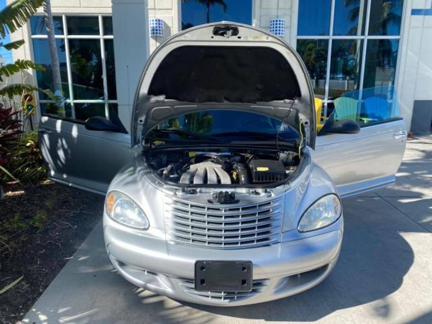 2005 Bright Silver Metallic /Dark Slate Gray Chrysler PT Cruiser GT LOW MILES 35,037 1 OWNER (3C3AY75S15T) with an 2.4L DOHC 16-Valve HO Turbo I4 Engine engine, Automatic transmission, located at 4701 North Dixie Hwy, Pompano Beach, FL, 33064, (954) 422-2889, 26.240938, -80.123474 - OUR WEBPAGE FLORIDACARS1.COM HAS OVER 100 PHOTOS AND FREE CARFAX LINK 2005 CHRYSLER PT CRUISER GT 1 OWNER VIN: 3C3AY75S15T362031 3 C 3 A Y 7 5 S 1 5 T 3 6 2 0 3 1 CONVERTIBLE 2.4L I4 F DOHC 16V GASOLINE 27 MPG FRONT WHEEL DRIVE Features ABS Brakes Air Conditioning Alloy Wheels AM/FM Stereo Automatic - Photo#17