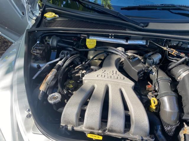 2005 Bright Silver Metallic /Dark Slate Gray Chrysler PT Cruiser GT LOW MILES 35,037 1 OWNER (3C3AY75S15T) with an 2.4L DOHC 16-Valve HO Turbo I4 Engine engine, Automatic transmission, located at 4701 North Dixie Hwy, Pompano Beach, FL, 33064, (954) 422-2889, 26.240938, -80.123474 - OUR WEBPAGE FLORIDACARS1.COM HAS OVER 100 PHOTOS AND FREE CARFAX LINK 2005 CHRYSLER PT CRUISER GT 1 OWNER VIN: 3C3AY75S15T362031 3 C 3 A Y 7 5 S 1 5 T 3 6 2 0 3 1 CONVERTIBLE 2.4L I4 F DOHC 16V GASOLINE 27 MPG FRONT WHEEL DRIVE Features ABS Brakes Air Conditioning Alloy Wheels AM/FM Stereo Automatic - Photo#24