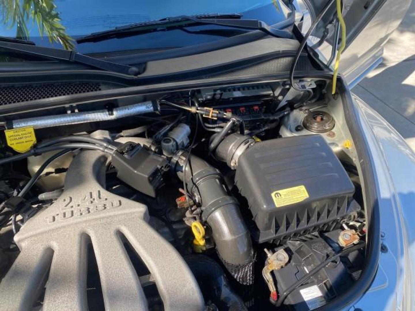 2005 Bright Silver Metallic /Dark Slate Gray Chrysler PT Cruiser GT LOW MILES 35,037 1 OWNER (3C3AY75S15T) with an 2.4L DOHC 16-Valve HO Turbo I4 Engine engine, Automatic transmission, located at 4701 North Dixie Hwy, Pompano Beach, FL, 33064, (954) 422-2889, 26.240938, -80.123474 - OUR WEBPAGE FLORIDACARS1.COM HAS OVER 100 PHOTOS AND FREE CARFAX LINK 2005 CHRYSLER PT CRUISER GT 1 OWNER VIN: 3C3AY75S15T362031 3 C 3 A Y 7 5 S 1 5 T 3 6 2 0 3 1 CONVERTIBLE 2.4L I4 F DOHC 16V GASOLINE 27 MPG FRONT WHEEL DRIVE Features ABS Brakes Air Conditioning Alloy Wheels AM/FM Stereo Automatic - Photo#25