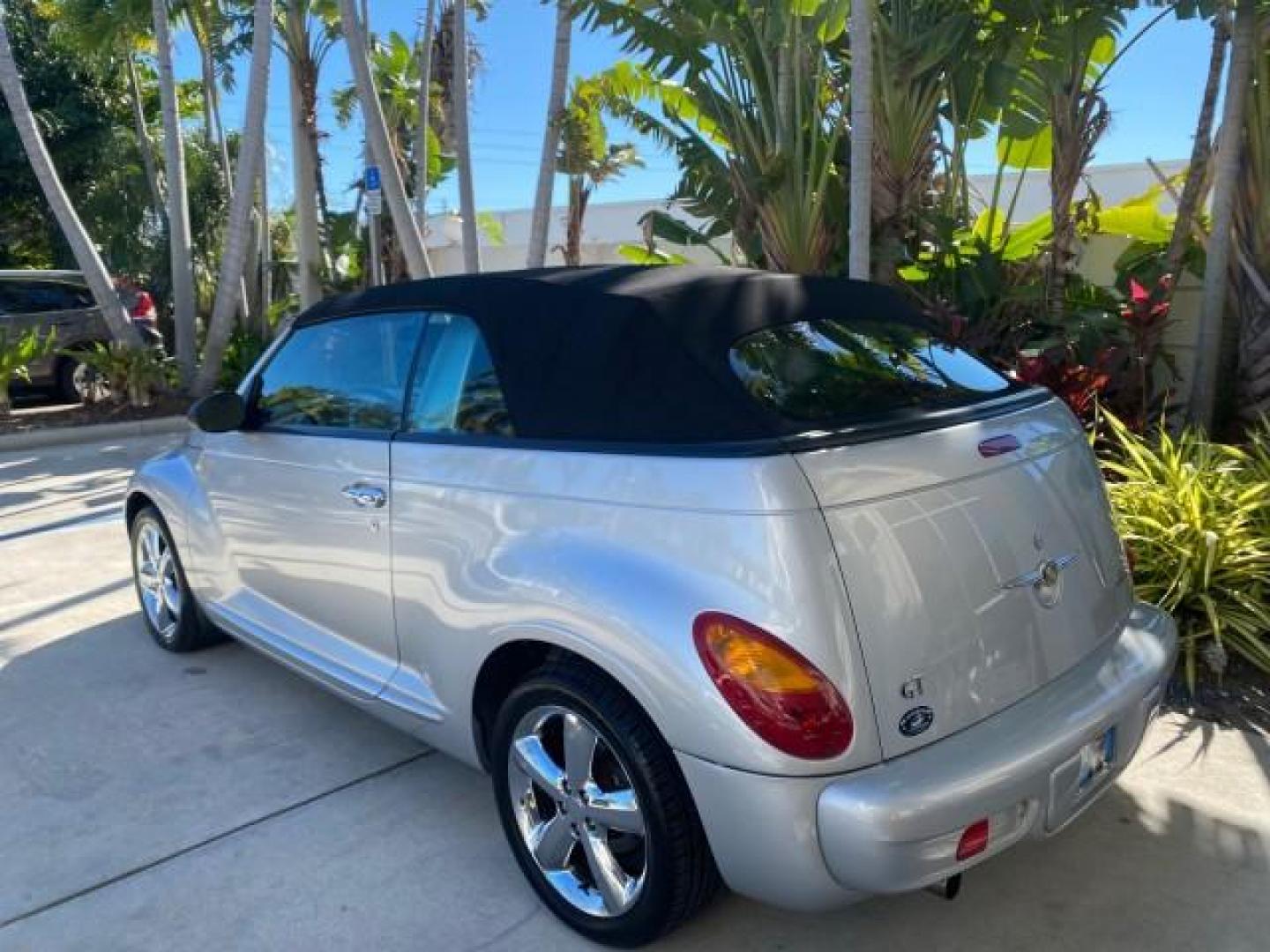 2005 Bright Silver Metallic /Dark Slate Gray Chrysler PT Cruiser GT LOW MILES 35,037 1 OWNER (3C3AY75S15T) with an 2.4L DOHC 16-Valve HO Turbo I4 Engine engine, Automatic transmission, located at 4701 North Dixie Hwy, Pompano Beach, FL, 33064, (954) 422-2889, 26.240938, -80.123474 - OUR WEBPAGE FLORIDACARS1.COM HAS OVER 100 PHOTOS AND FREE CARFAX LINK 2005 CHRYSLER PT CRUISER GT 1 OWNER VIN: 3C3AY75S15T362031 3 C 3 A Y 7 5 S 1 5 T 3 6 2 0 3 1 CONVERTIBLE 2.4L I4 F DOHC 16V GASOLINE 27 MPG FRONT WHEEL DRIVE Features ABS Brakes Air Conditioning Alloy Wheels AM/FM Stereo Automatic - Photo#40