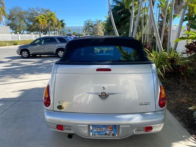2005 Bright Silver Metallic /Dark Slate Gray Chrysler PT Cruiser GT LOW MILES 35,037 1 OWNER (3C3AY75S15T) with an 2.4L DOHC 16-Valve HO Turbo I4 Engine engine, Automatic transmission, located at 4701 North Dixie Hwy, Pompano Beach, FL, 33064, (954) 422-2889, 26.240938, -80.123474 - OUR WEBPAGE FLORIDACARS1.COM HAS OVER 100 PHOTOS AND FREE CARFAX LINK 2005 CHRYSLER PT CRUISER GT 1 OWNER VIN: 3C3AY75S15T362031 3 C 3 A Y 7 5 S 1 5 T 3 6 2 0 3 1 CONVERTIBLE 2.4L I4 F DOHC 16V GASOLINE 27 MPG FRONT WHEEL DRIVE Features ABS Brakes Air Conditioning Alloy Wheels AM/FM Stereo Automatic - Photo#43