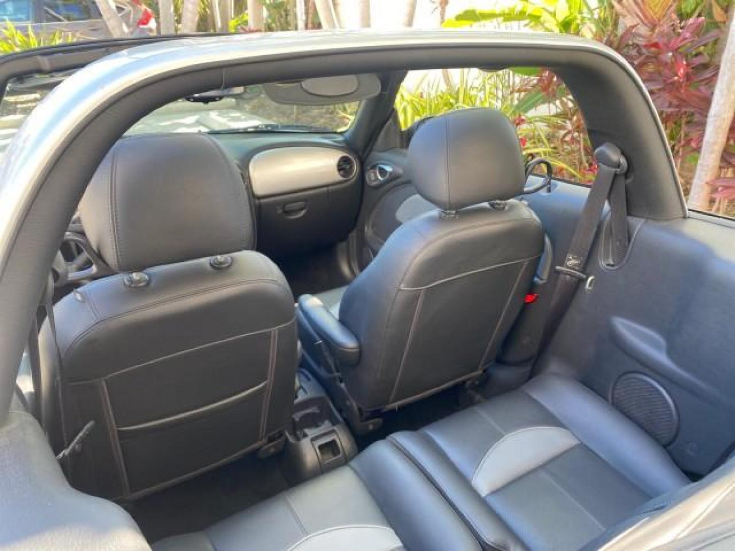 2005 Bright Silver Metallic /Dark Slate Gray Chrysler PT Cruiser GT LOW MILES 35,037 1 OWNER (3C3AY75S15T) with an 2.4L DOHC 16-Valve HO Turbo I4 Engine engine, Automatic transmission, located at 4701 North Dixie Hwy, Pompano Beach, FL, 33064, (954) 422-2889, 26.240938, -80.123474 - OUR WEBPAGE FLORIDACARS1.COM HAS OVER 100 PHOTOS AND FREE CARFAX LINK 2005 CHRYSLER PT CRUISER GT 1 OWNER VIN: 3C3AY75S15T362031 3 C 3 A Y 7 5 S 1 5 T 3 6 2 0 3 1 CONVERTIBLE 2.4L I4 F DOHC 16V GASOLINE 27 MPG FRONT WHEEL DRIVE Features ABS Brakes Air Conditioning Alloy Wheels AM/FM Stereo Automatic - Photo#47