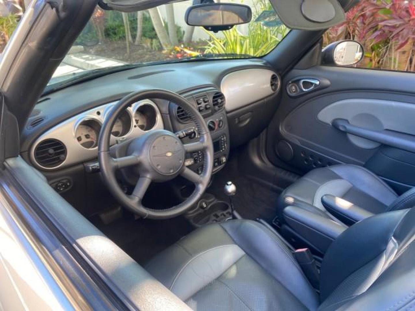 2005 Bright Silver Metallic /Dark Slate Gray Chrysler PT Cruiser GT LOW MILES 35,037 1 OWNER (3C3AY75S15T) with an 2.4L DOHC 16-Valve HO Turbo I4 Engine engine, Automatic transmission, located at 4701 North Dixie Hwy, Pompano Beach, FL, 33064, (954) 422-2889, 26.240938, -80.123474 - OUR WEBPAGE FLORIDACARS1.COM HAS OVER 100 PHOTOS AND FREE CARFAX LINK 2005 CHRYSLER PT CRUISER GT 1 OWNER VIN: 3C3AY75S15T362031 3 C 3 A Y 7 5 S 1 5 T 3 6 2 0 3 1 CONVERTIBLE 2.4L I4 F DOHC 16V GASOLINE 27 MPG FRONT WHEEL DRIVE Features ABS Brakes Air Conditioning Alloy Wheels AM/FM Stereo Automatic - Photo#48