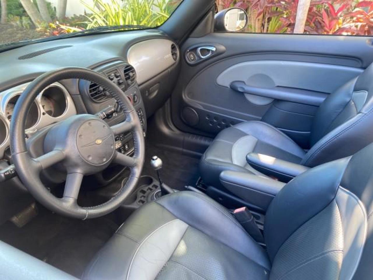 2005 Bright Silver Metallic /Dark Slate Gray Chrysler PT Cruiser GT LOW MILES 35,037 1 OWNER (3C3AY75S15T) with an 2.4L DOHC 16-Valve HO Turbo I4 Engine engine, Automatic transmission, located at 4701 North Dixie Hwy, Pompano Beach, FL, 33064, (954) 422-2889, 26.240938, -80.123474 - OUR WEBPAGE FLORIDACARS1.COM HAS OVER 100 PHOTOS AND FREE CARFAX LINK 2005 CHRYSLER PT CRUISER GT 1 OWNER VIN: 3C3AY75S15T362031 3 C 3 A Y 7 5 S 1 5 T 3 6 2 0 3 1 CONVERTIBLE 2.4L I4 F DOHC 16V GASOLINE 27 MPG FRONT WHEEL DRIVE Features ABS Brakes Air Conditioning Alloy Wheels AM/FM Stereo Automatic - Photo#49