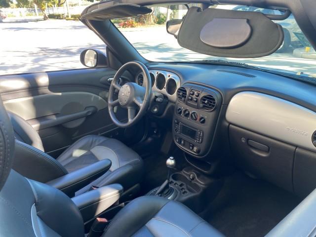 2005 Bright Silver Metallic /Dark Slate Gray Chrysler PT Cruiser GT LOW MILES 35,037 1 OWNER (3C3AY75S15T) with an 2.4L DOHC 16-Valve HO Turbo I4 Engine engine, Automatic transmission, located at 4701 North Dixie Hwy, Pompano Beach, FL, 33064, (954) 422-2889, 26.240938, -80.123474 - OUR WEBPAGE FLORIDACARS1.COM HAS OVER 100 PHOTOS AND FREE CARFAX LINK 2005 CHRYSLER PT CRUISER GT 1 OWNER VIN: 3C3AY75S15T362031 3 C 3 A Y 7 5 S 1 5 T 3 6 2 0 3 1 CONVERTIBLE 2.4L I4 F DOHC 16V GASOLINE 27 MPG FRONT WHEEL DRIVE Features ABS Brakes Air Conditioning Alloy Wheels AM/FM Stereo Automatic - Photo#51