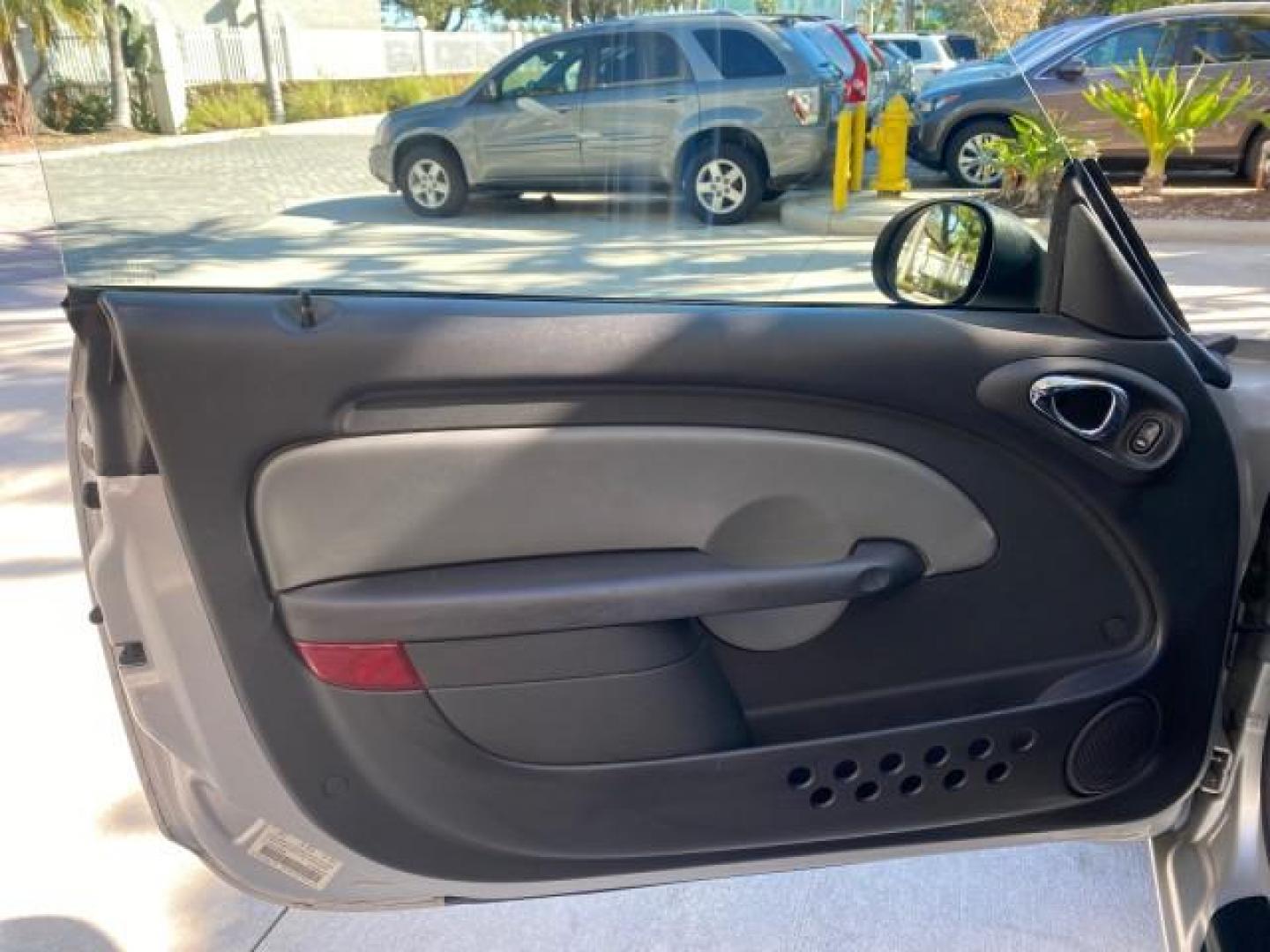 2005 Bright Silver Metallic /Dark Slate Gray Chrysler PT Cruiser GT LOW MILES 35,037 1 OWNER (3C3AY75S15T) with an 2.4L DOHC 16-Valve HO Turbo I4 Engine engine, Automatic transmission, located at 4701 North Dixie Hwy, Pompano Beach, FL, 33064, (954) 422-2889, 26.240938, -80.123474 - OUR WEBPAGE FLORIDACARS1.COM HAS OVER 100 PHOTOS AND FREE CARFAX LINK 2005 CHRYSLER PT CRUISER GT 1 OWNER VIN: 3C3AY75S15T362031 3 C 3 A Y 7 5 S 1 5 T 3 6 2 0 3 1 CONVERTIBLE 2.4L I4 F DOHC 16V GASOLINE 27 MPG FRONT WHEEL DRIVE Features ABS Brakes Air Conditioning Alloy Wheels AM/FM Stereo Automatic - Photo#60