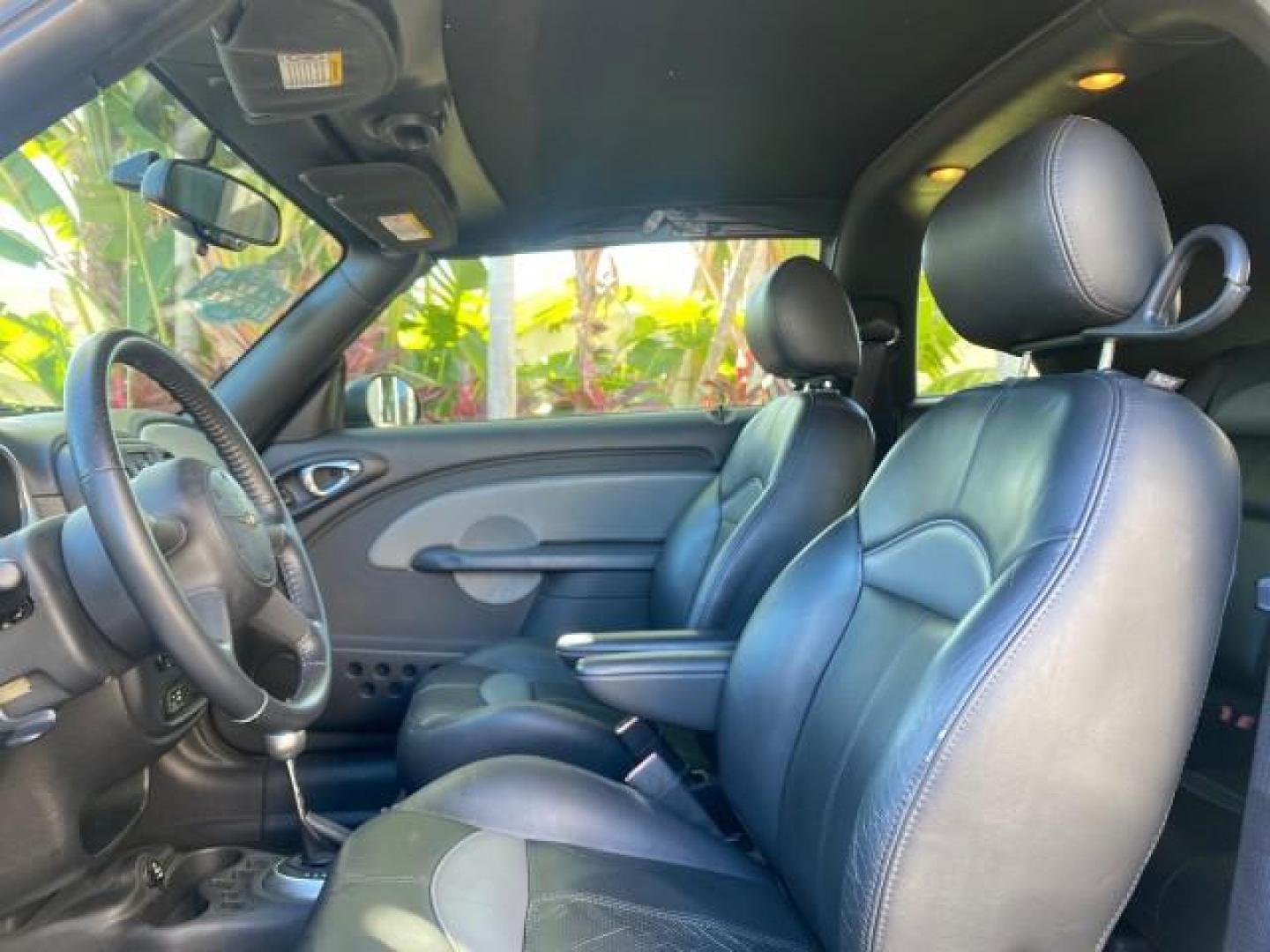2005 Bright Silver Metallic /Dark Slate Gray Chrysler PT Cruiser GT LOW MILES 35,037 1 OWNER (3C3AY75S15T) with an 2.4L DOHC 16-Valve HO Turbo I4 Engine engine, Automatic transmission, located at 4701 North Dixie Hwy, Pompano Beach, FL, 33064, (954) 422-2889, 26.240938, -80.123474 - OUR WEBPAGE FLORIDACARS1.COM HAS OVER 100 PHOTOS AND FREE CARFAX LINK 2005 CHRYSLER PT CRUISER GT 1 OWNER VIN: 3C3AY75S15T362031 3 C 3 A Y 7 5 S 1 5 T 3 6 2 0 3 1 CONVERTIBLE 2.4L I4 F DOHC 16V GASOLINE 27 MPG FRONT WHEEL DRIVE Features ABS Brakes Air Conditioning Alloy Wheels AM/FM Stereo Automatic - Photo#62