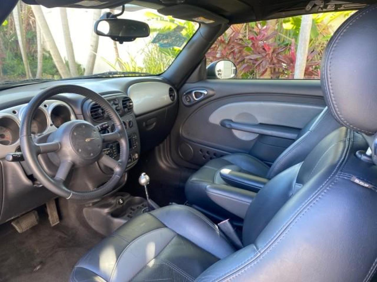 2005 Bright Silver Metallic /Dark Slate Gray Chrysler PT Cruiser GT LOW MILES 35,037 1 OWNER (3C3AY75S15T) with an 2.4L DOHC 16-Valve HO Turbo I4 Engine engine, Automatic transmission, located at 4701 North Dixie Hwy, Pompano Beach, FL, 33064, (954) 422-2889, 26.240938, -80.123474 - OUR WEBPAGE FLORIDACARS1.COM HAS OVER 100 PHOTOS AND FREE CARFAX LINK 2005 CHRYSLER PT CRUISER GT 1 OWNER VIN: 3C3AY75S15T362031 3 C 3 A Y 7 5 S 1 5 T 3 6 2 0 3 1 CONVERTIBLE 2.4L I4 F DOHC 16V GASOLINE 27 MPG FRONT WHEEL DRIVE Features ABS Brakes Air Conditioning Alloy Wheels AM/FM Stereo Automatic - Photo#63