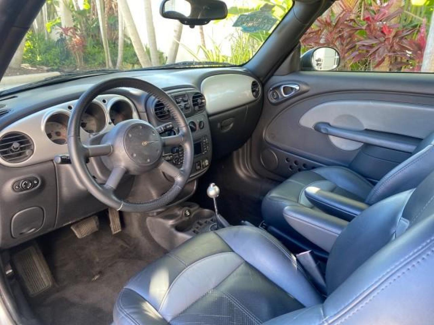 2005 Bright Silver Metallic /Dark Slate Gray Chrysler PT Cruiser GT LOW MILES 35,037 1 OWNER (3C3AY75S15T) with an 2.4L DOHC 16-Valve HO Turbo I4 Engine engine, Automatic transmission, located at 4701 North Dixie Hwy, Pompano Beach, FL, 33064, (954) 422-2889, 26.240938, -80.123474 - OUR WEBPAGE FLORIDACARS1.COM HAS OVER 100 PHOTOS AND FREE CARFAX LINK 2005 CHRYSLER PT CRUISER GT 1 OWNER VIN: 3C3AY75S15T362031 3 C 3 A Y 7 5 S 1 5 T 3 6 2 0 3 1 CONVERTIBLE 2.4L I4 F DOHC 16V GASOLINE 27 MPG FRONT WHEEL DRIVE Features ABS Brakes Air Conditioning Alloy Wheels AM/FM Stereo Automatic - Photo#64