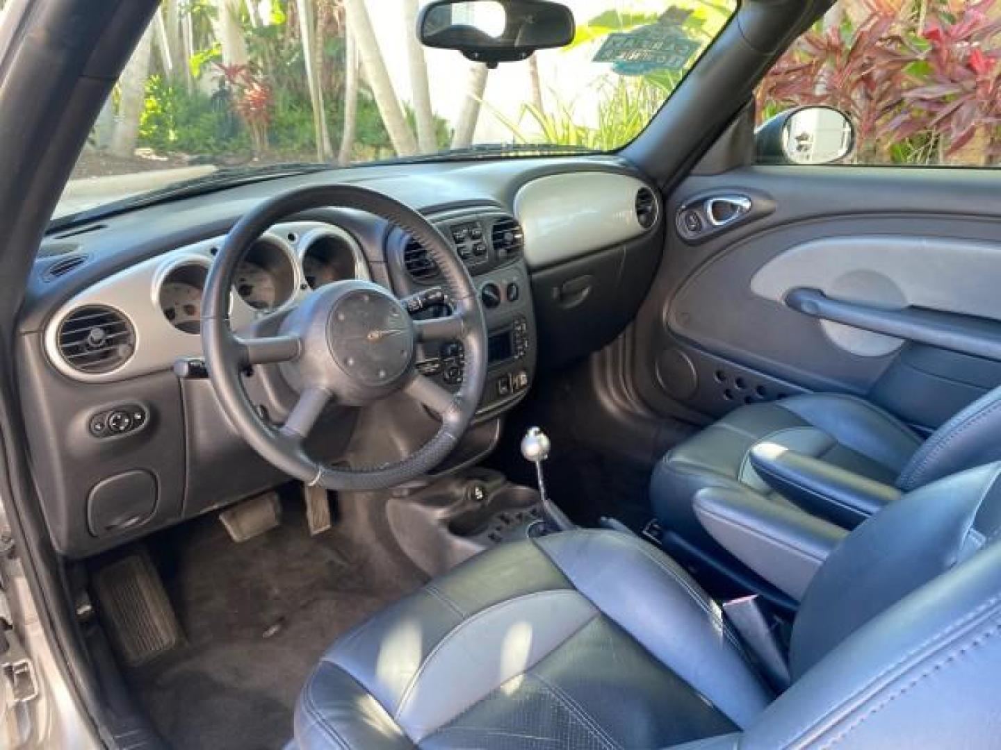 2005 Bright Silver Metallic /Dark Slate Gray Chrysler PT Cruiser GT LOW MILES 35,037 1 OWNER (3C3AY75S15T) with an 2.4L DOHC 16-Valve HO Turbo I4 Engine engine, Automatic transmission, located at 4701 North Dixie Hwy, Pompano Beach, FL, 33064, (954) 422-2889, 26.240938, -80.123474 - OUR WEBPAGE FLORIDACARS1.COM HAS OVER 100 PHOTOS AND FREE CARFAX LINK 2005 CHRYSLER PT CRUISER GT 1 OWNER VIN: 3C3AY75S15T362031 3 C 3 A Y 7 5 S 1 5 T 3 6 2 0 3 1 CONVERTIBLE 2.4L I4 F DOHC 16V GASOLINE 27 MPG FRONT WHEEL DRIVE Features ABS Brakes Air Conditioning Alloy Wheels AM/FM Stereo Automatic - Photo#65