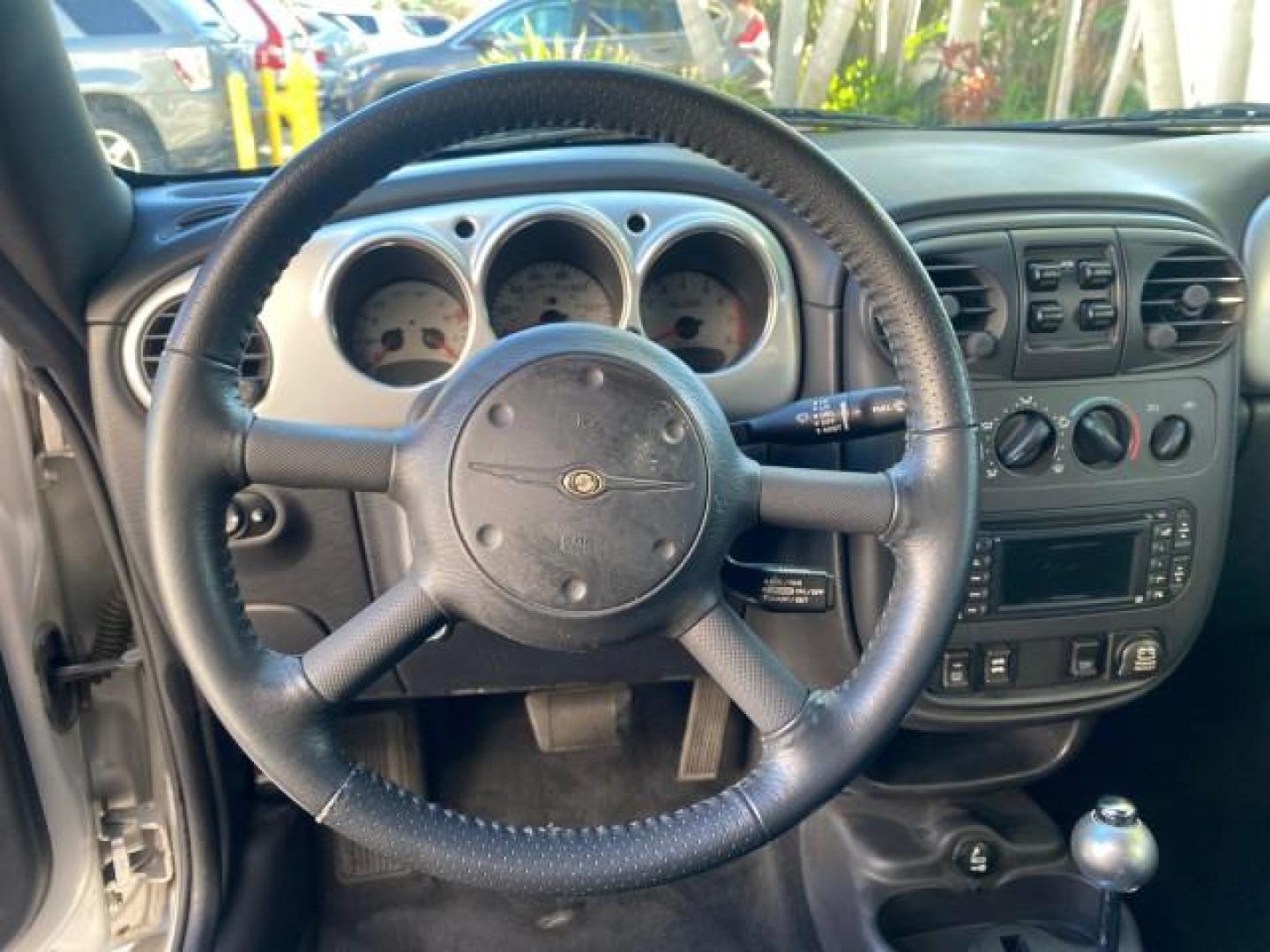 2005 Bright Silver Metallic /Dark Slate Gray Chrysler PT Cruiser GT LOW MILES 35,037 1 OWNER (3C3AY75S15T) with an 2.4L DOHC 16-Valve HO Turbo I4 Engine engine, Automatic transmission, located at 4701 North Dixie Hwy, Pompano Beach, FL, 33064, (954) 422-2889, 26.240938, -80.123474 - OUR WEBPAGE FLORIDACARS1.COM HAS OVER 100 PHOTOS AND FREE CARFAX LINK 2005 CHRYSLER PT CRUISER GT 1 OWNER VIN: 3C3AY75S15T362031 3 C 3 A Y 7 5 S 1 5 T 3 6 2 0 3 1 CONVERTIBLE 2.4L I4 F DOHC 16V GASOLINE 27 MPG FRONT WHEEL DRIVE Features ABS Brakes Air Conditioning Alloy Wheels AM/FM Stereo Automatic - Photo#66