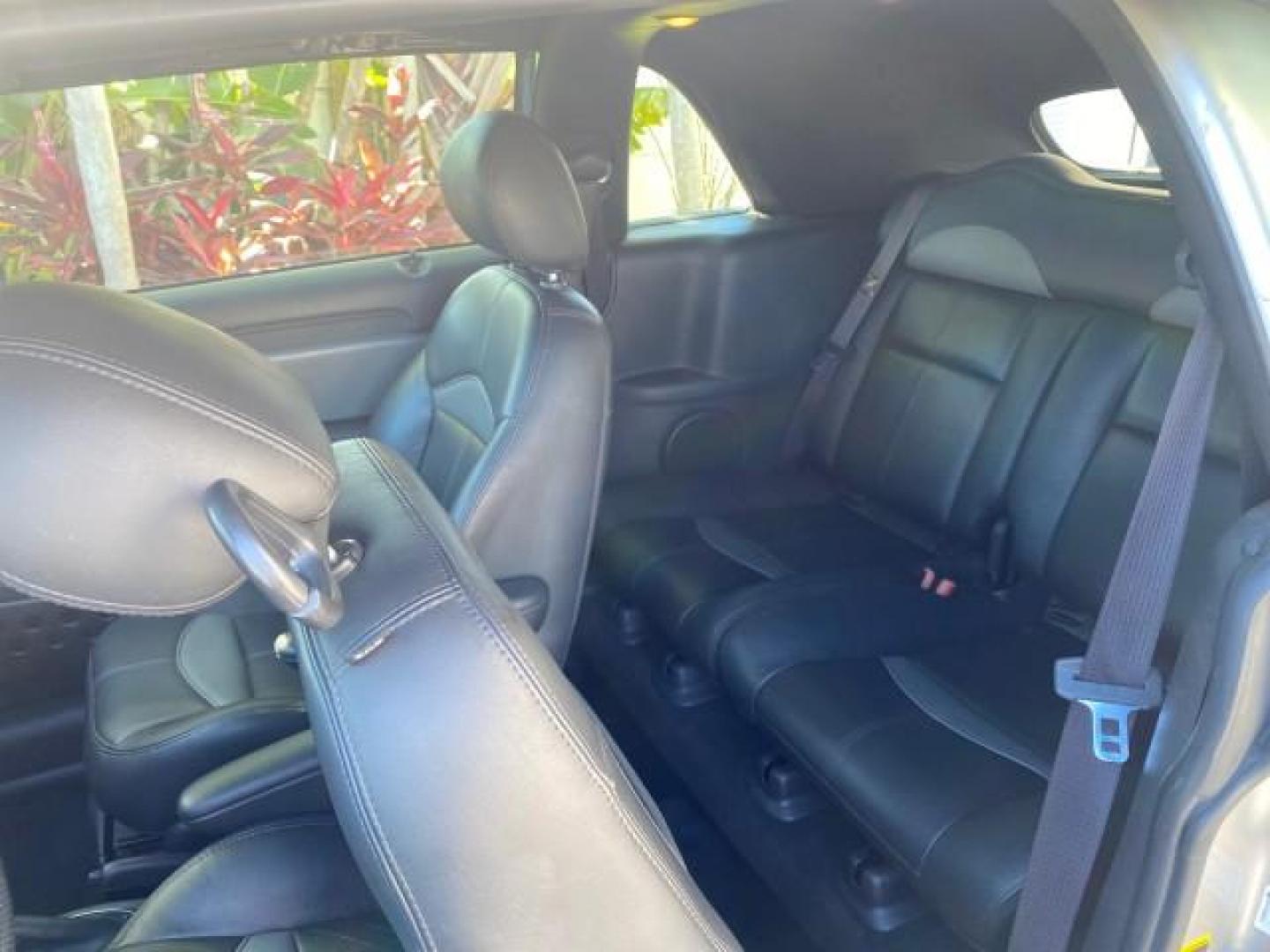 2005 Bright Silver Metallic /Dark Slate Gray Chrysler PT Cruiser GT LOW MILES 35,037 1 OWNER (3C3AY75S15T) with an 2.4L DOHC 16-Valve HO Turbo I4 Engine engine, Automatic transmission, located at 4701 North Dixie Hwy, Pompano Beach, FL, 33064, (954) 422-2889, 26.240938, -80.123474 - OUR WEBPAGE FLORIDACARS1.COM HAS OVER 100 PHOTOS AND FREE CARFAX LINK 2005 CHRYSLER PT CRUISER GT 1 OWNER VIN: 3C3AY75S15T362031 3 C 3 A Y 7 5 S 1 5 T 3 6 2 0 3 1 CONVERTIBLE 2.4L I4 F DOHC 16V GASOLINE 27 MPG FRONT WHEEL DRIVE Features ABS Brakes Air Conditioning Alloy Wheels AM/FM Stereo Automatic - Photo#86