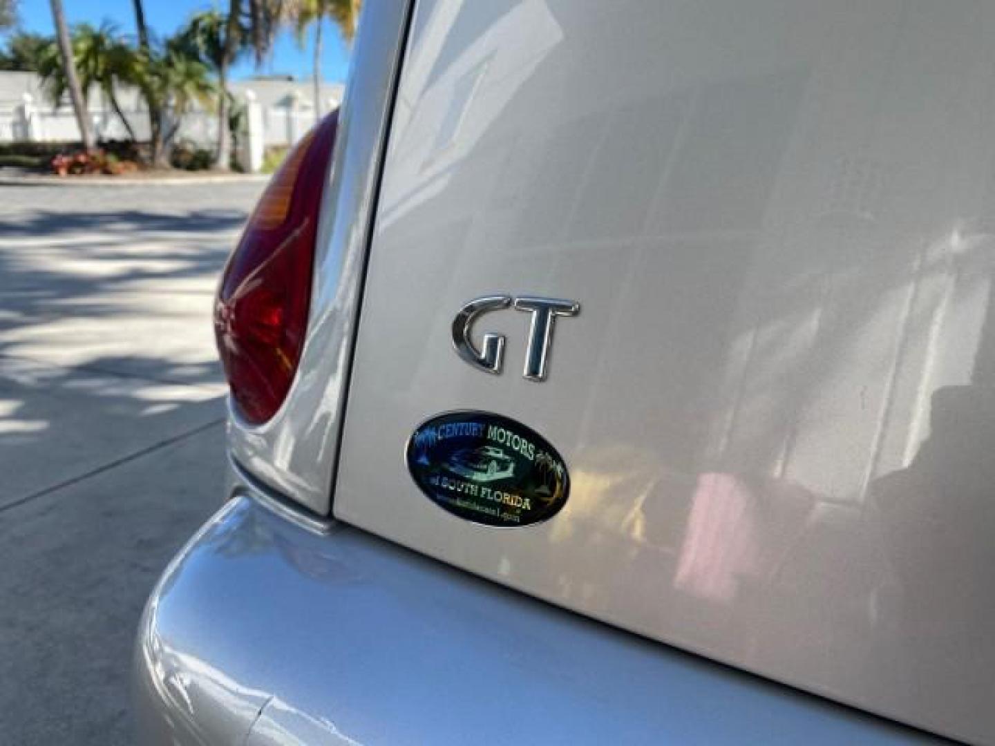 2005 Bright Silver Metallic /Dark Slate Gray Chrysler PT Cruiser GT LOW MILES 35,037 1 OWNER (3C3AY75S15T) with an 2.4L DOHC 16-Valve HO Turbo I4 Engine engine, Automatic transmission, located at 4701 North Dixie Hwy, Pompano Beach, FL, 33064, (954) 422-2889, 26.240938, -80.123474 - OUR WEBPAGE FLORIDACARS1.COM HAS OVER 100 PHOTOS AND FREE CARFAX LINK 2005 CHRYSLER PT CRUISER GT 1 OWNER VIN: 3C3AY75S15T362031 3 C 3 A Y 7 5 S 1 5 T 3 6 2 0 3 1 CONVERTIBLE 2.4L I4 F DOHC 16V GASOLINE 27 MPG FRONT WHEEL DRIVE Features ABS Brakes Air Conditioning Alloy Wheels AM/FM Stereo Automatic - Photo#96