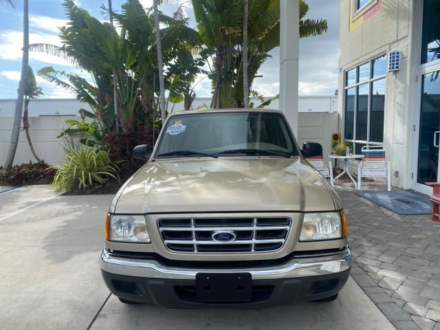 2002 Harvest Gold Metallic /Med Prairie Tan Ford Ranger XLT LOW MILES 62,461 1 OWNER (1FTYR44U32P) with an 3.0L SEFI V6 Engine engine, Automatic transmission, located at 4701 North Dixie Hwy, Pompano Beach, FL, 33064, (954) 422-2889, 26.240938, -80.123474 - OUR WEBPAGE FLORIDACARS1.COM HAS OVER 100 PHOTOS AND FREE CARFAX LINK 2002 FORD RANGER XLT APPEARANCE 1 OWNER VIN: 1FTYR44U32PA13610 1 F T Y R 4 4 U 3 2 P A 1 3 6 1 0 4 DOOR EXTENDED CAB PICKUP 3.0L V6 F OHV GASOLINE 22 MPG REAR WHEEL DRIVE Features ABS Brakes Air Conditioning AM/FM Stereo Bed Liner - Photo#2